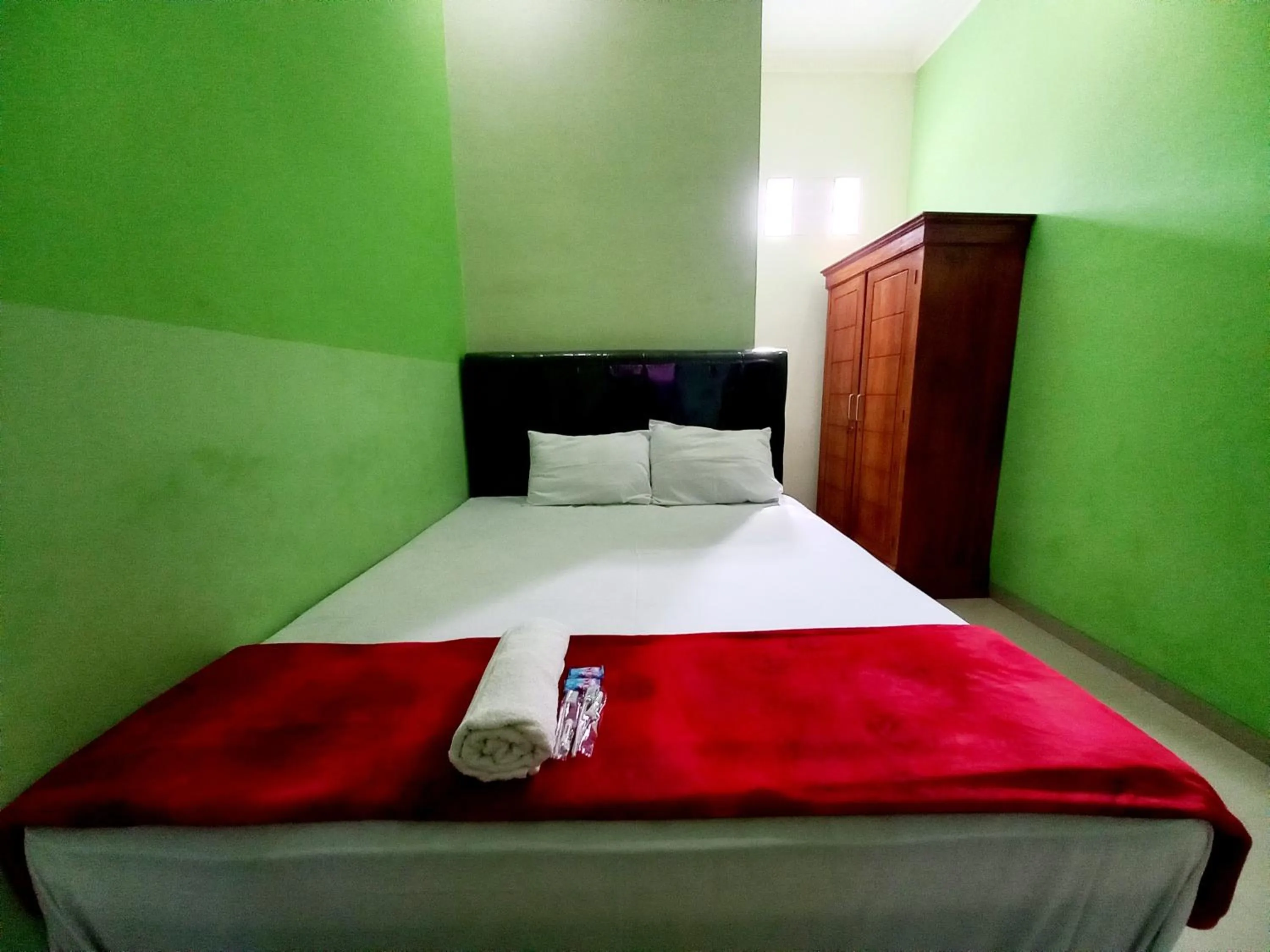 Bed in Harmony House Syariah near Alun Alun Pati Mitra RedDoorz