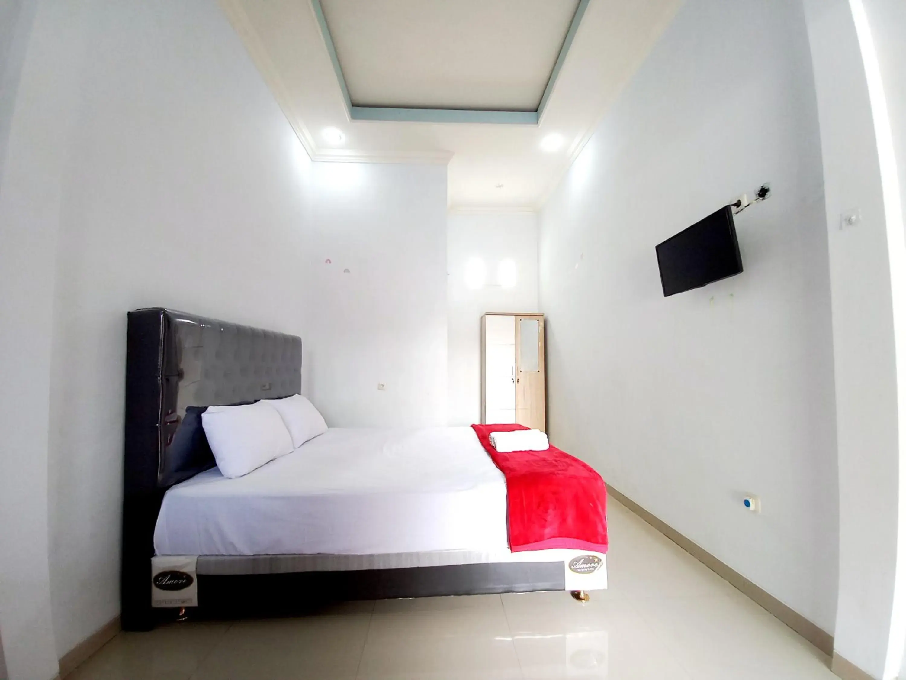 Bed in Harmony House Syariah near Alun Alun Pati Mitra RedDoorz Bed in Harmony House Syariah near Alun Alun Pati Mitra RedDoorz