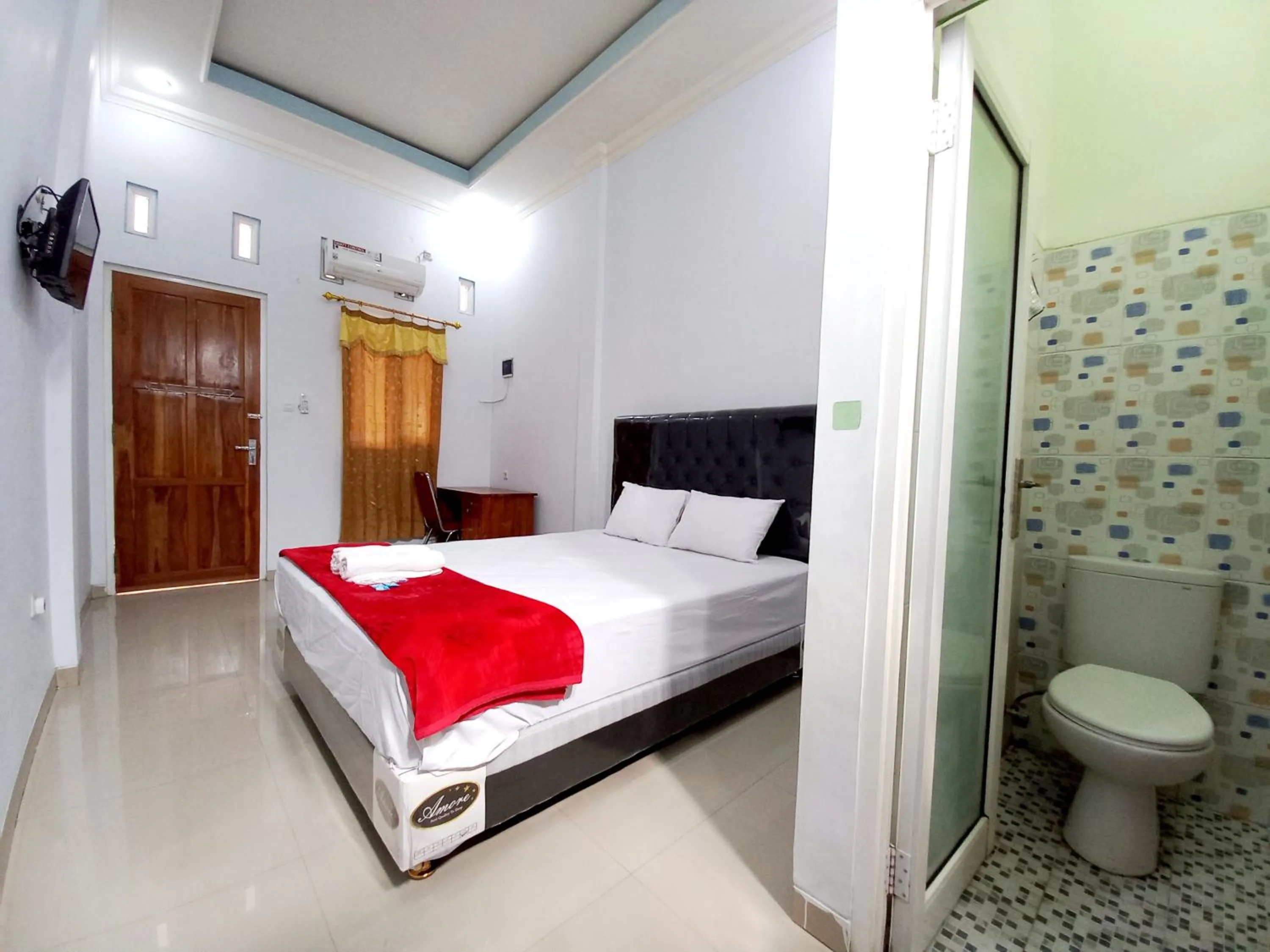 Bed in Harmony House Syariah near Alun Alun Pati Mitra RedDoorz