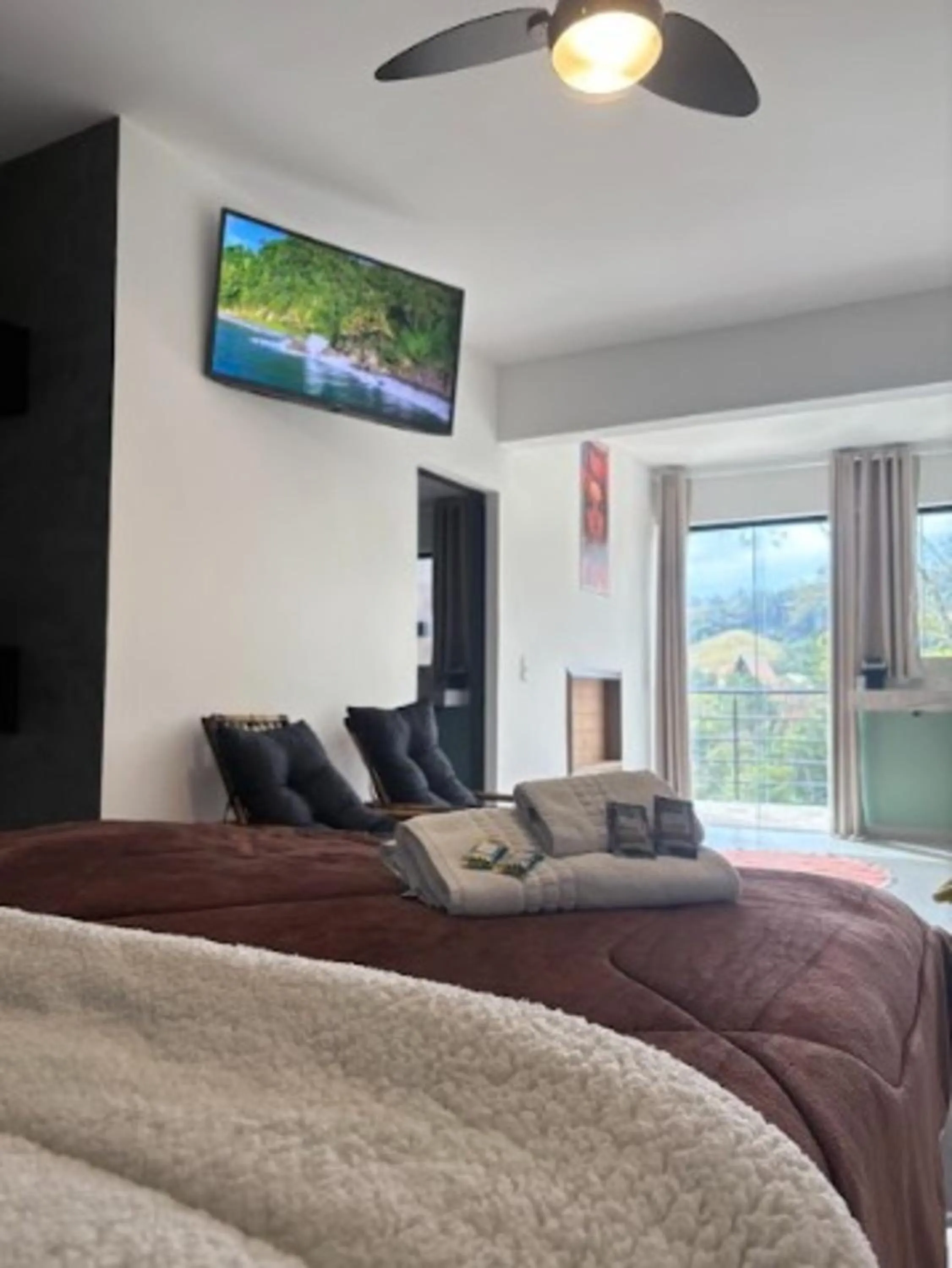 Bed in Pousada Recanto da Cascata