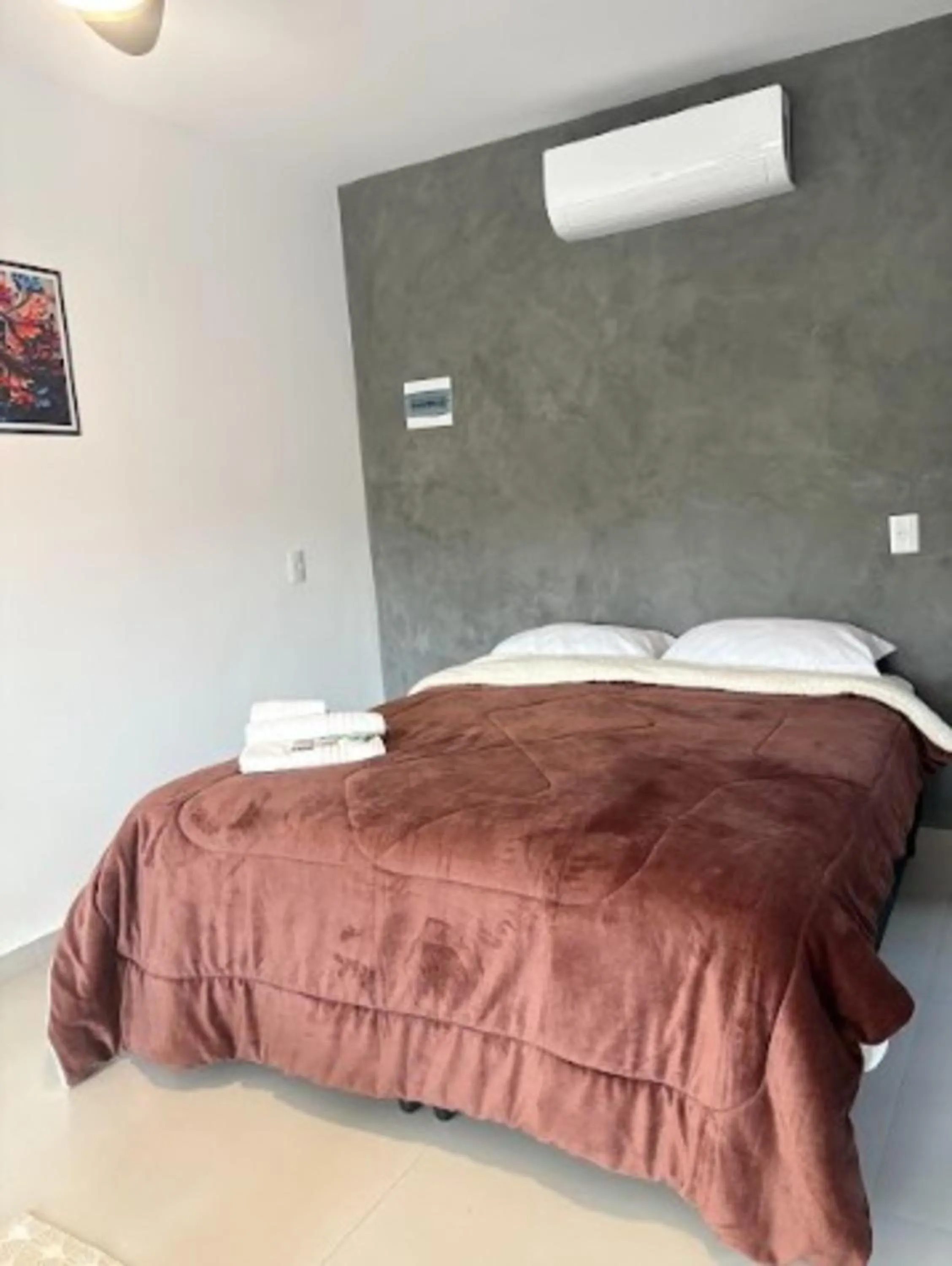 Bed in Pousada Recanto da Cascata