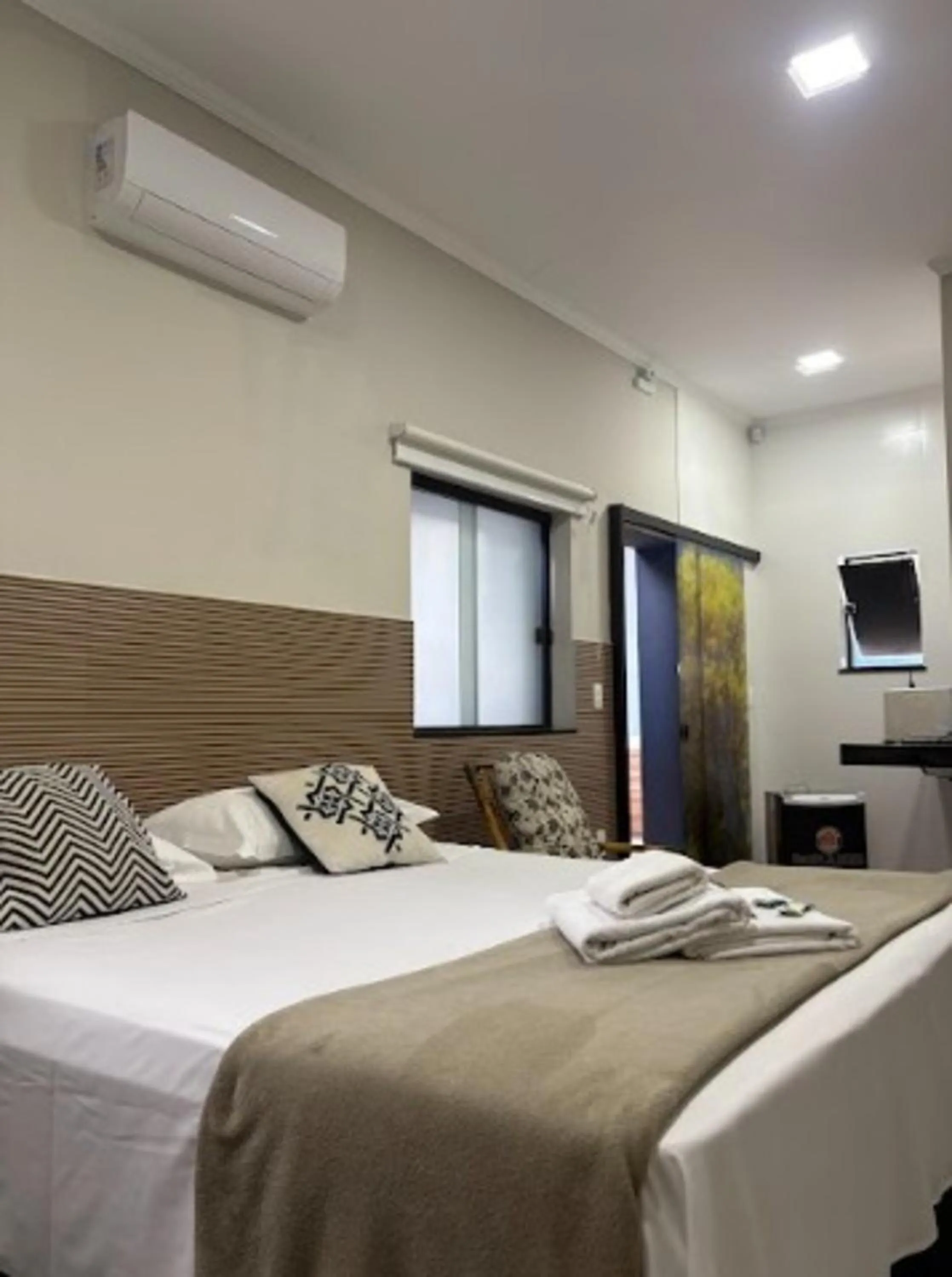 Bed in Pousada Recanto da Cascata