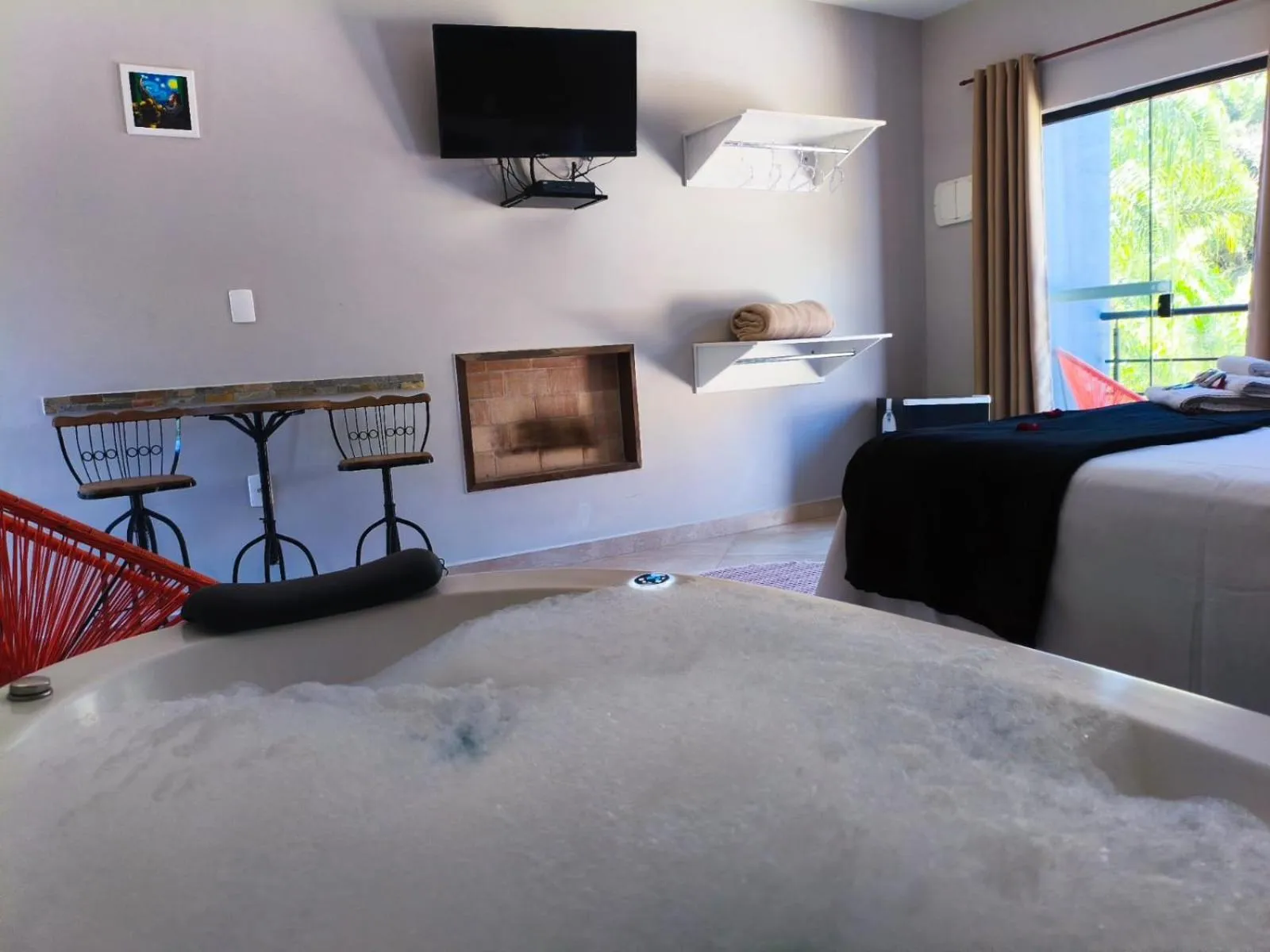 Photo of the whole room in Pousada Recanto da Cascata