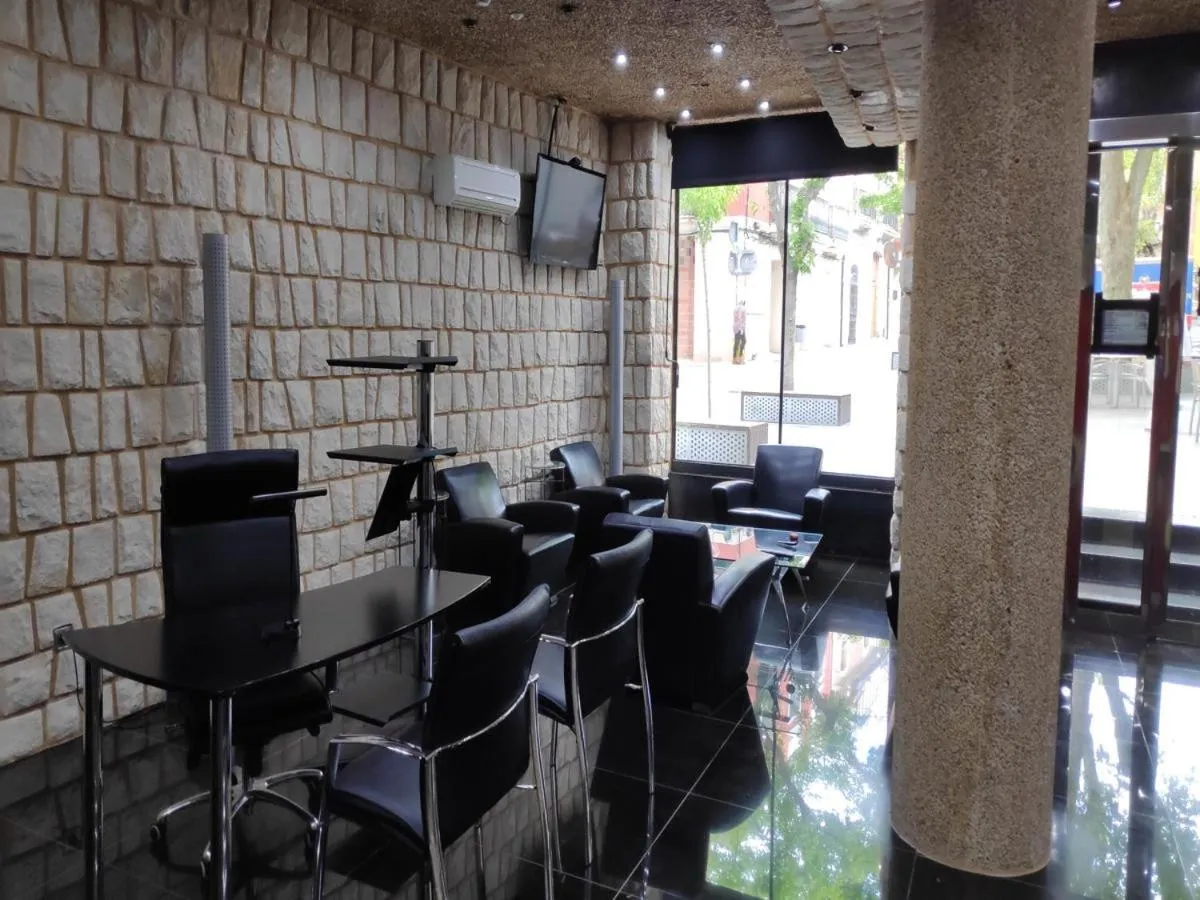 Communal lounge/ TV room in Hotel Plata