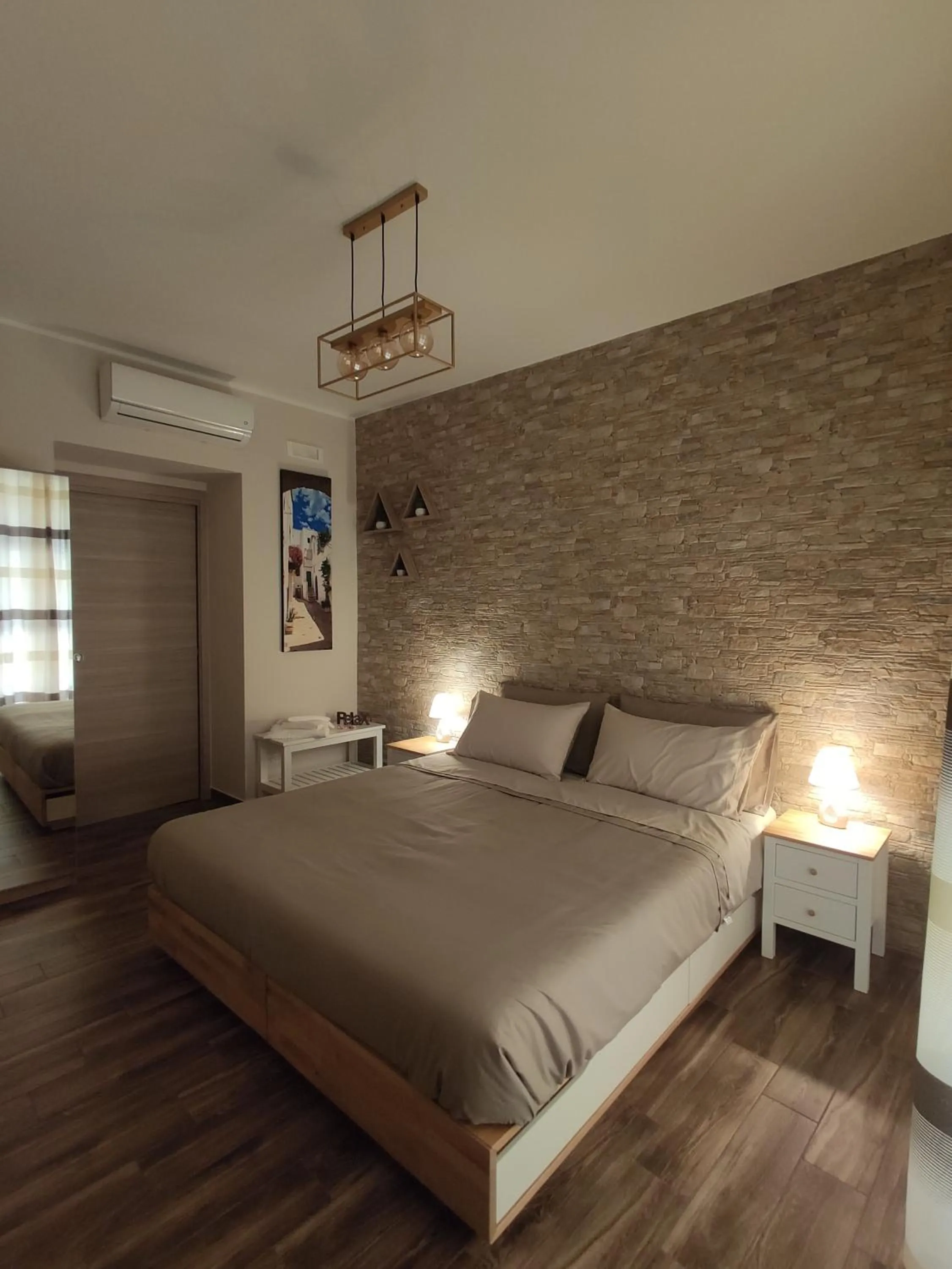 Bed in Tizzy Apartment & Rooms