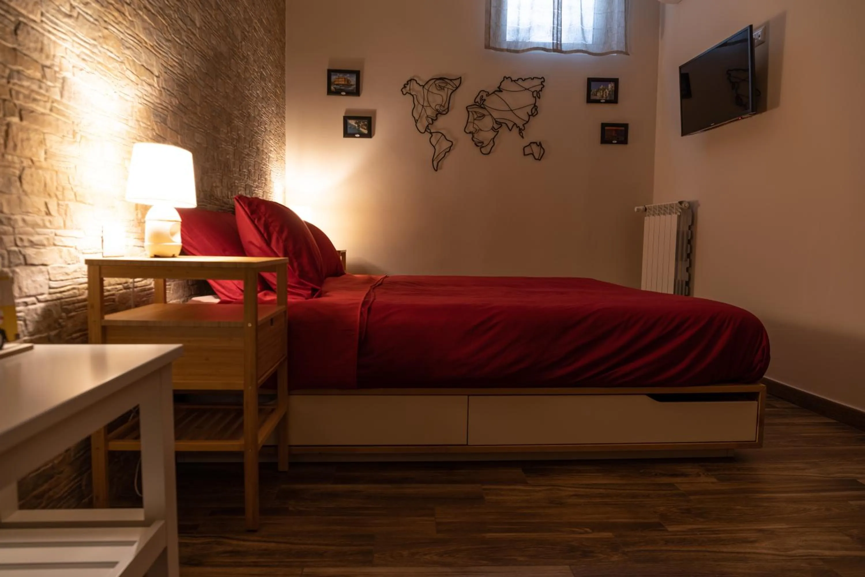 Bed in Tizzy Apartment & Rooms