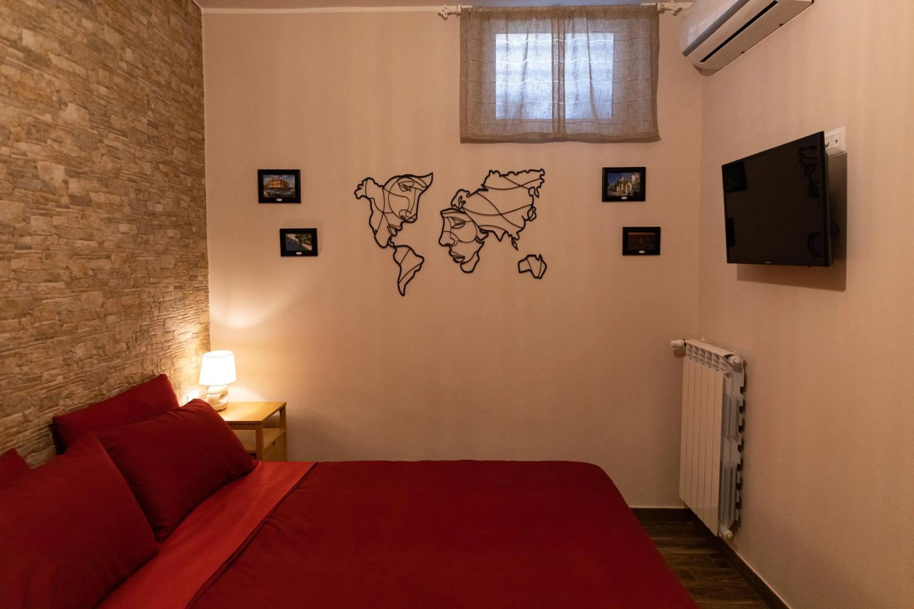 Bed in Tizzy Apartment & Rooms