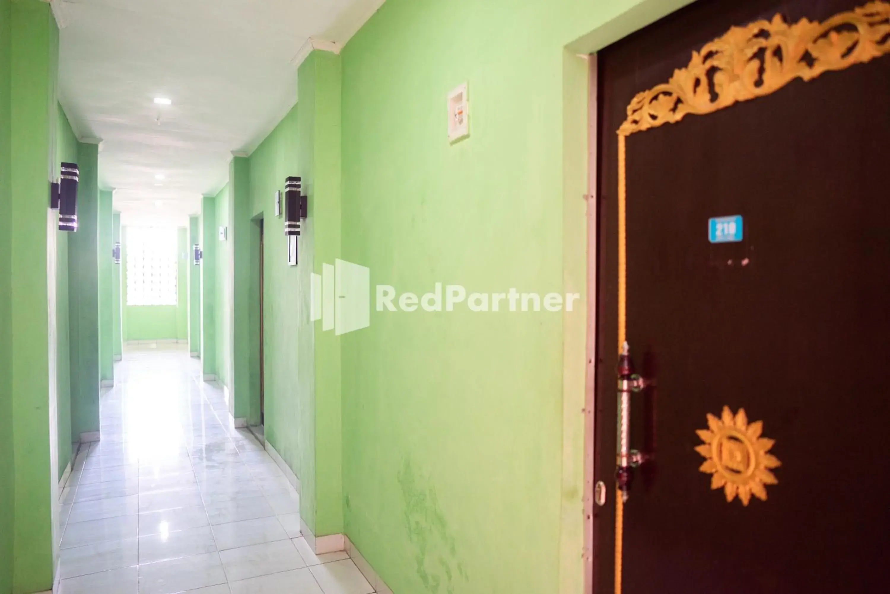 Property building in Hotel Ratu Ayu 2 Lampung Mitra RedDoorz Property building in Hotel Ratu Ayu 2 Lampung Mitra RedDoorz