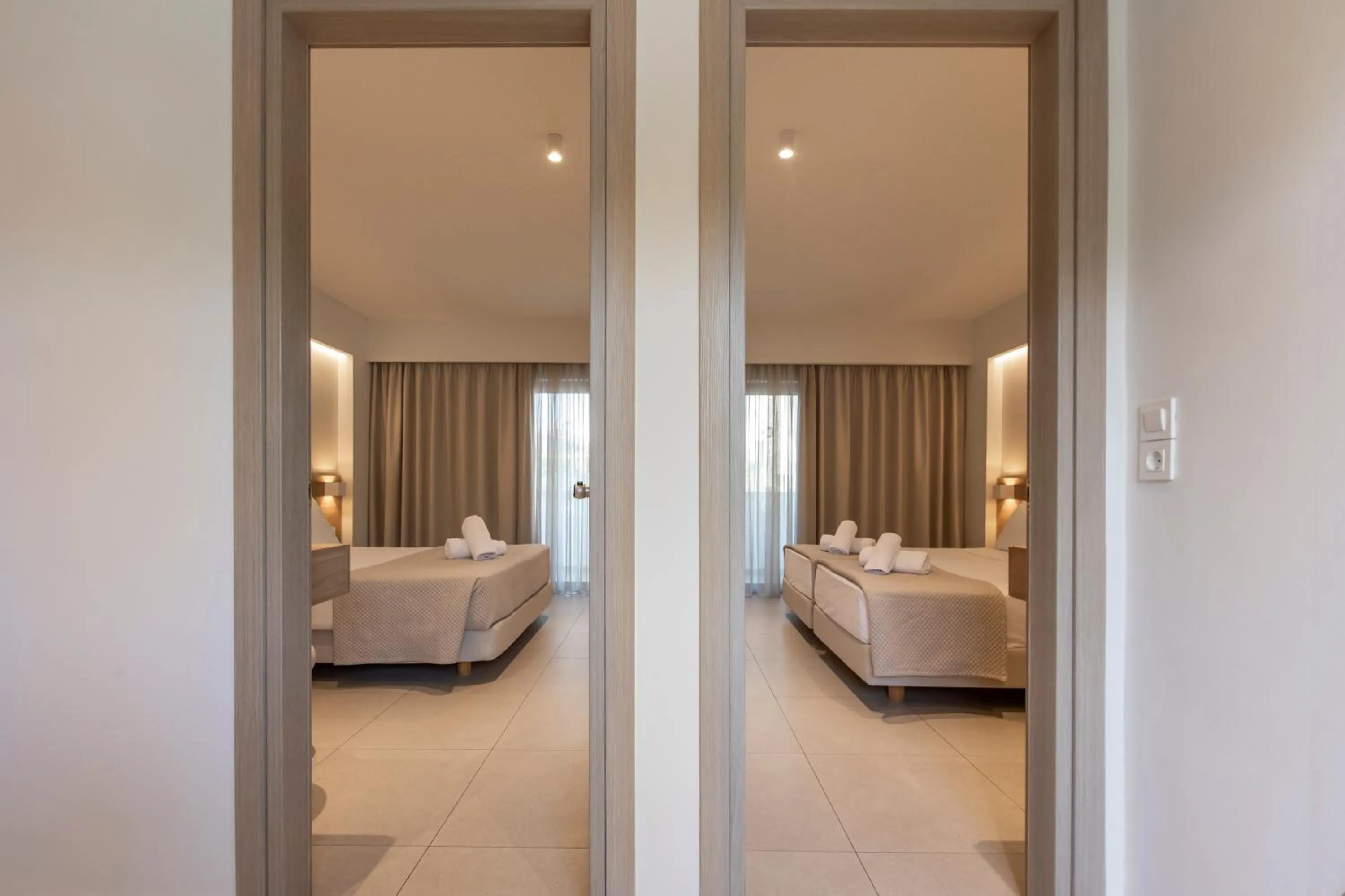 Photo of the whole room, Bed in Mythos Suites Hotel