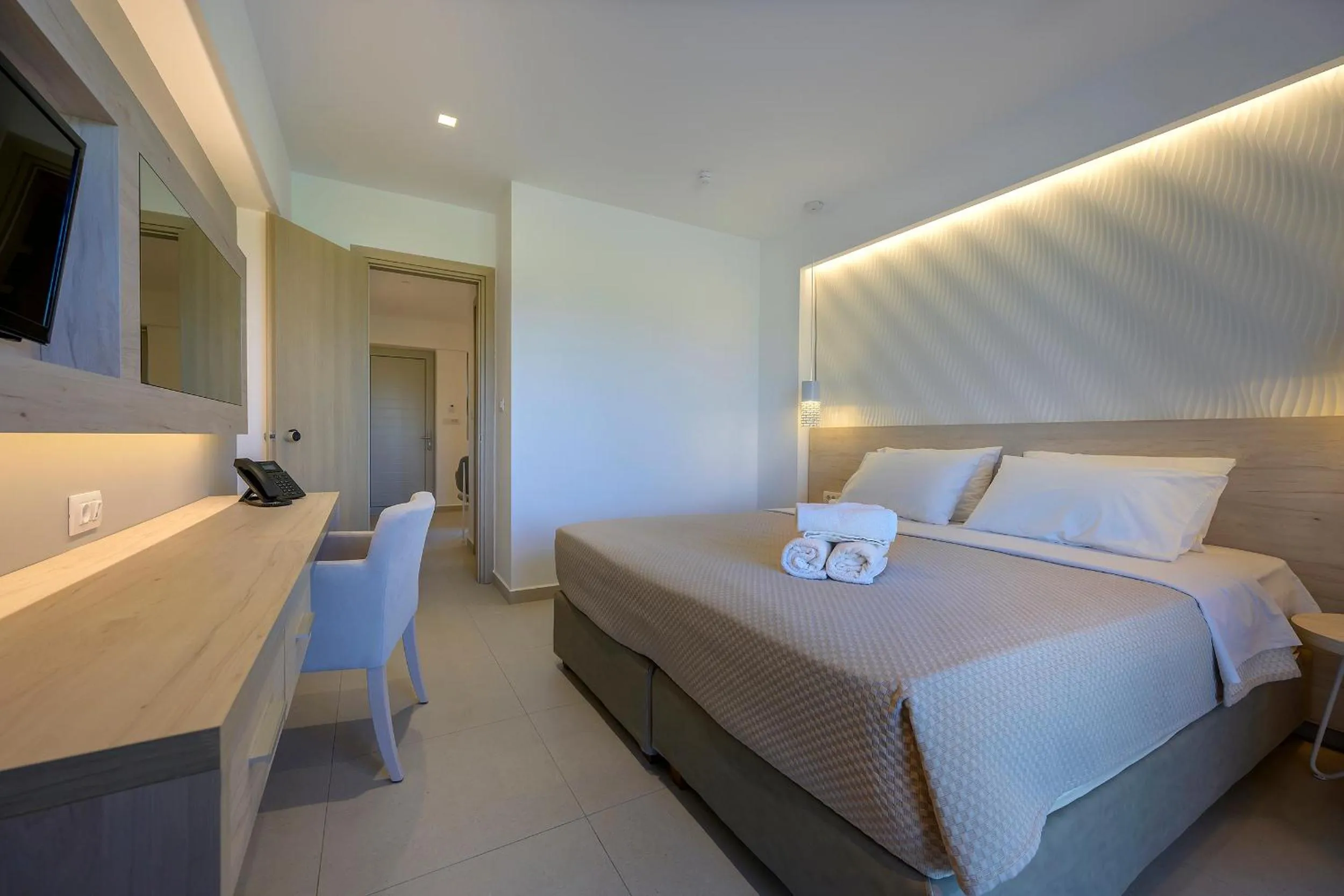 Bedroom, Bed in Mythos Suites Hotel