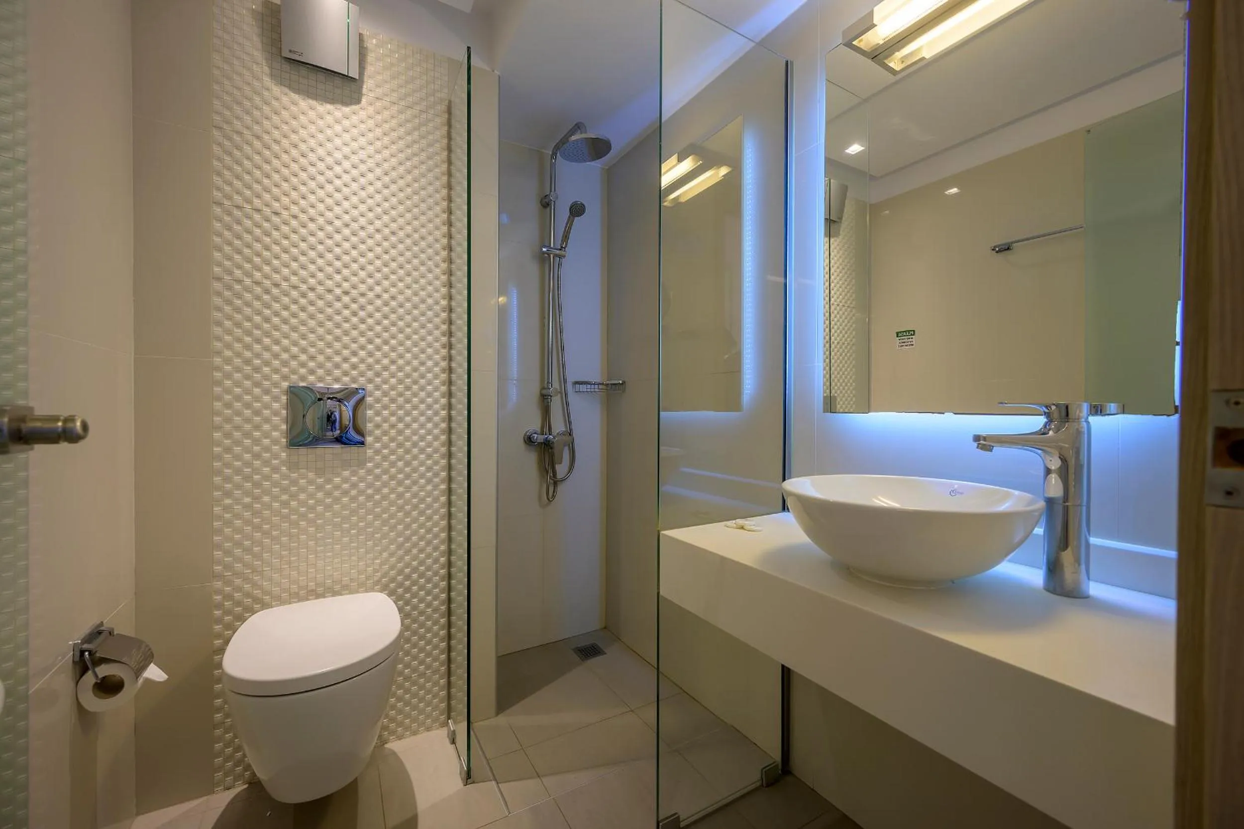 Bathroom in Mythos Suites Hotel