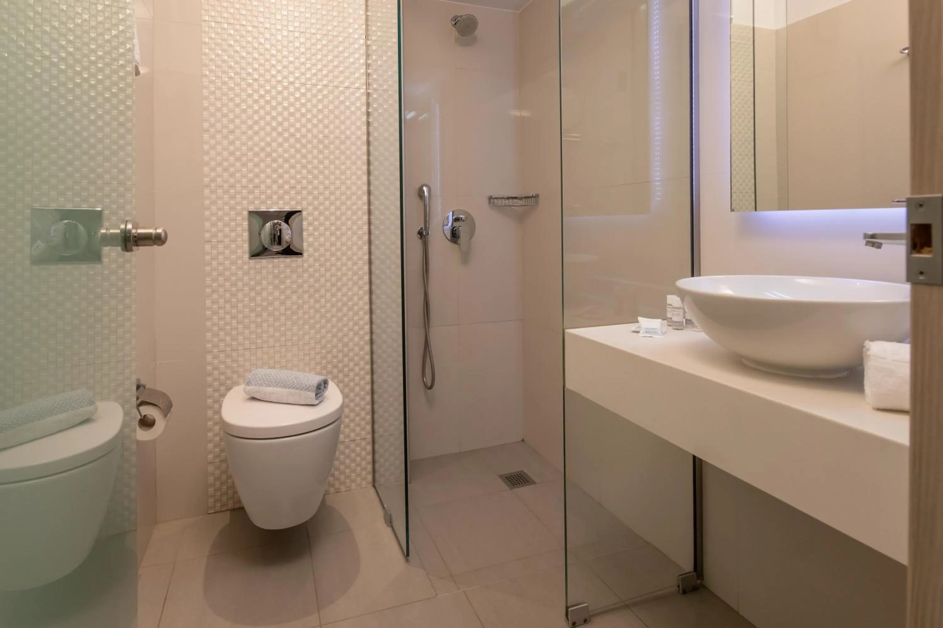 Bathroom in Mythos Suites Hotel