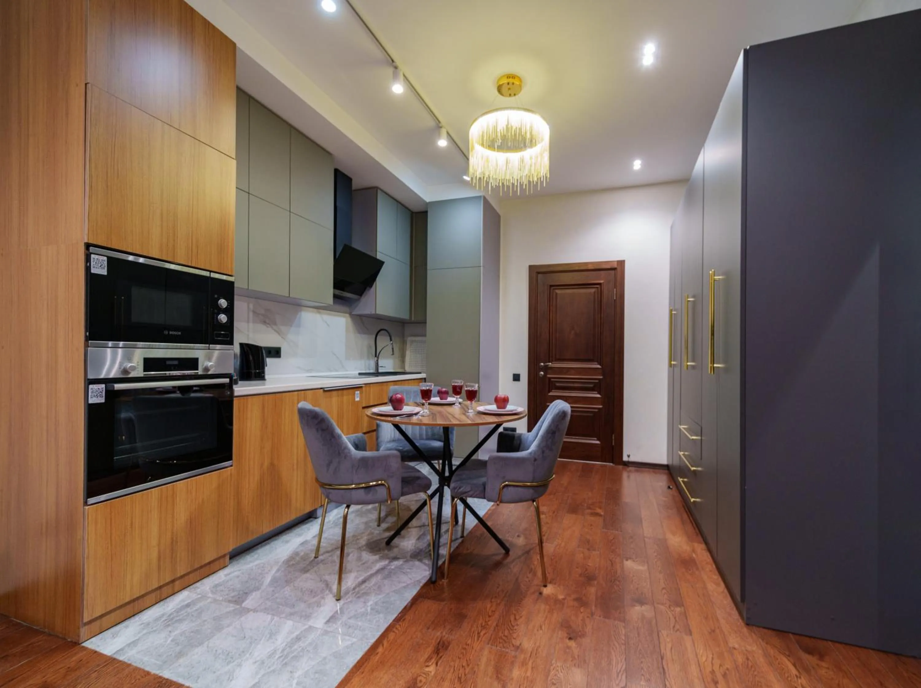 Kitchen or kitchenette in Arch Apart Hotel