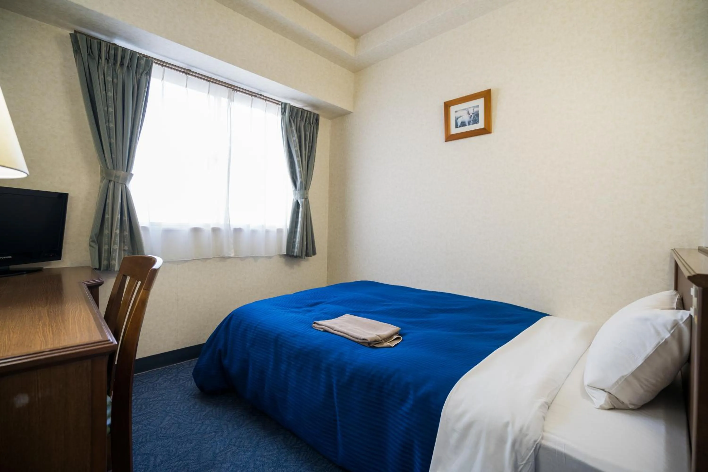 Bed in Suihoukaku Hotel