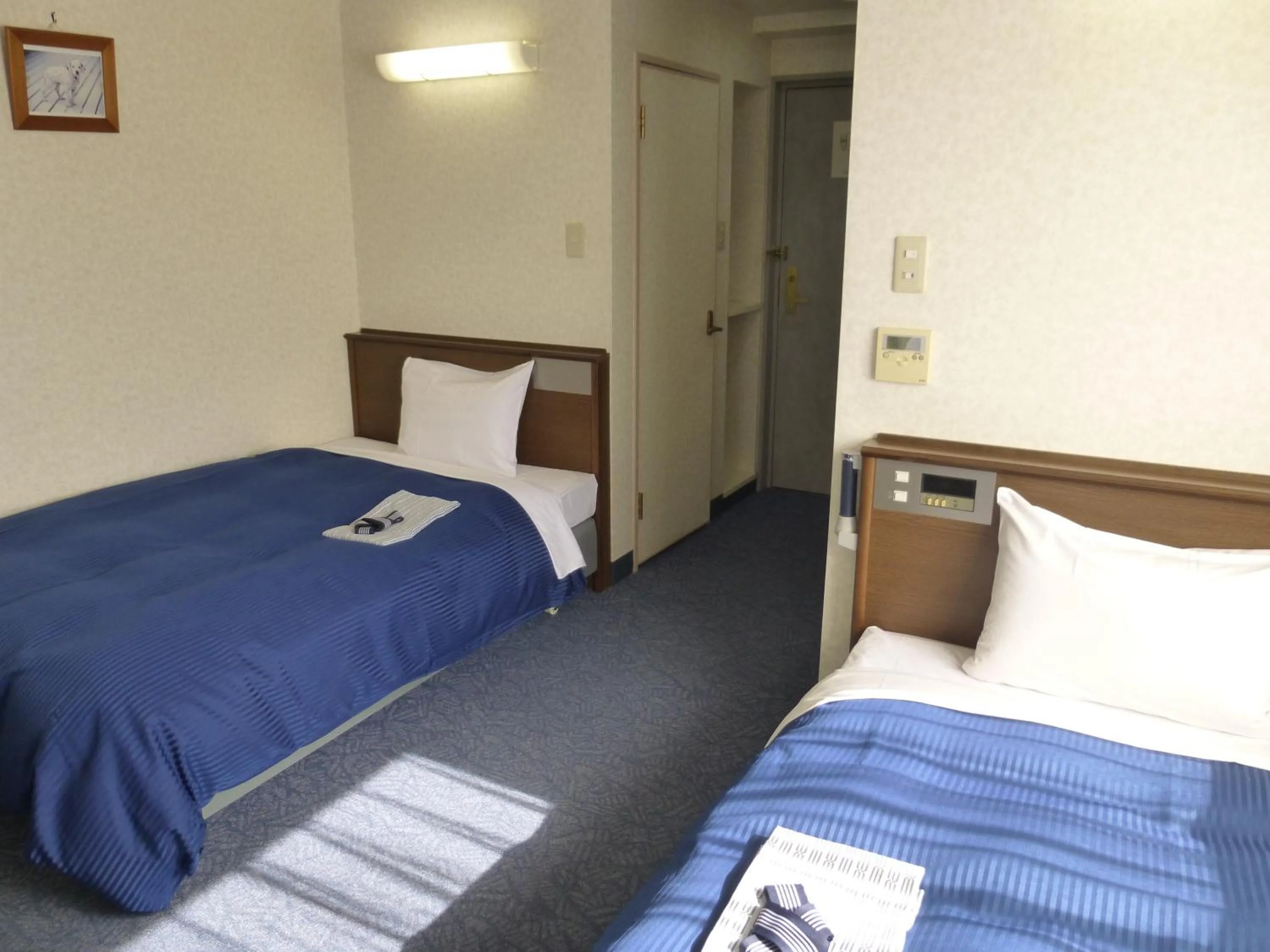 Bed in Suihoukaku Hotel