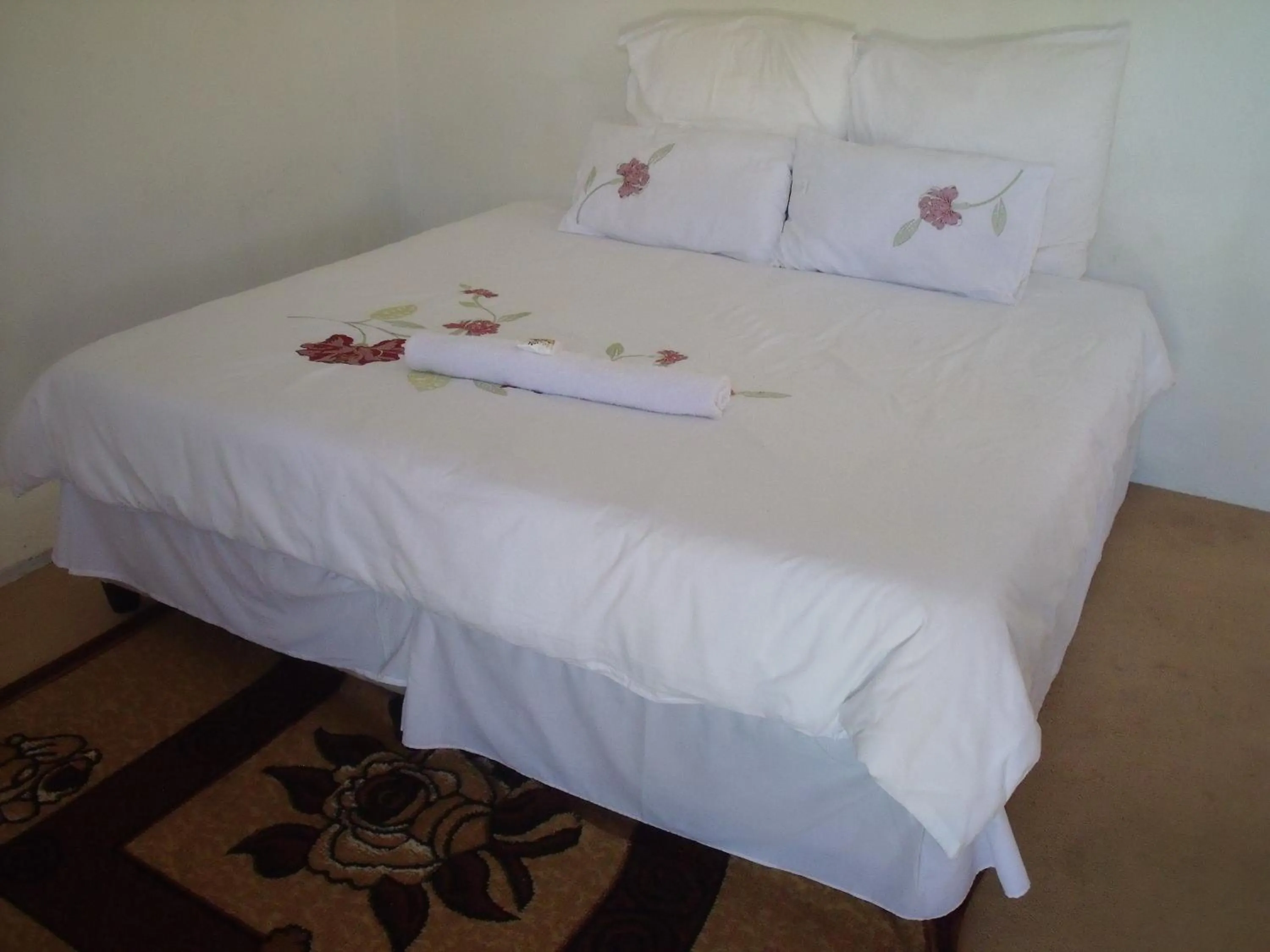 Bed in Rainbow Guesthouse