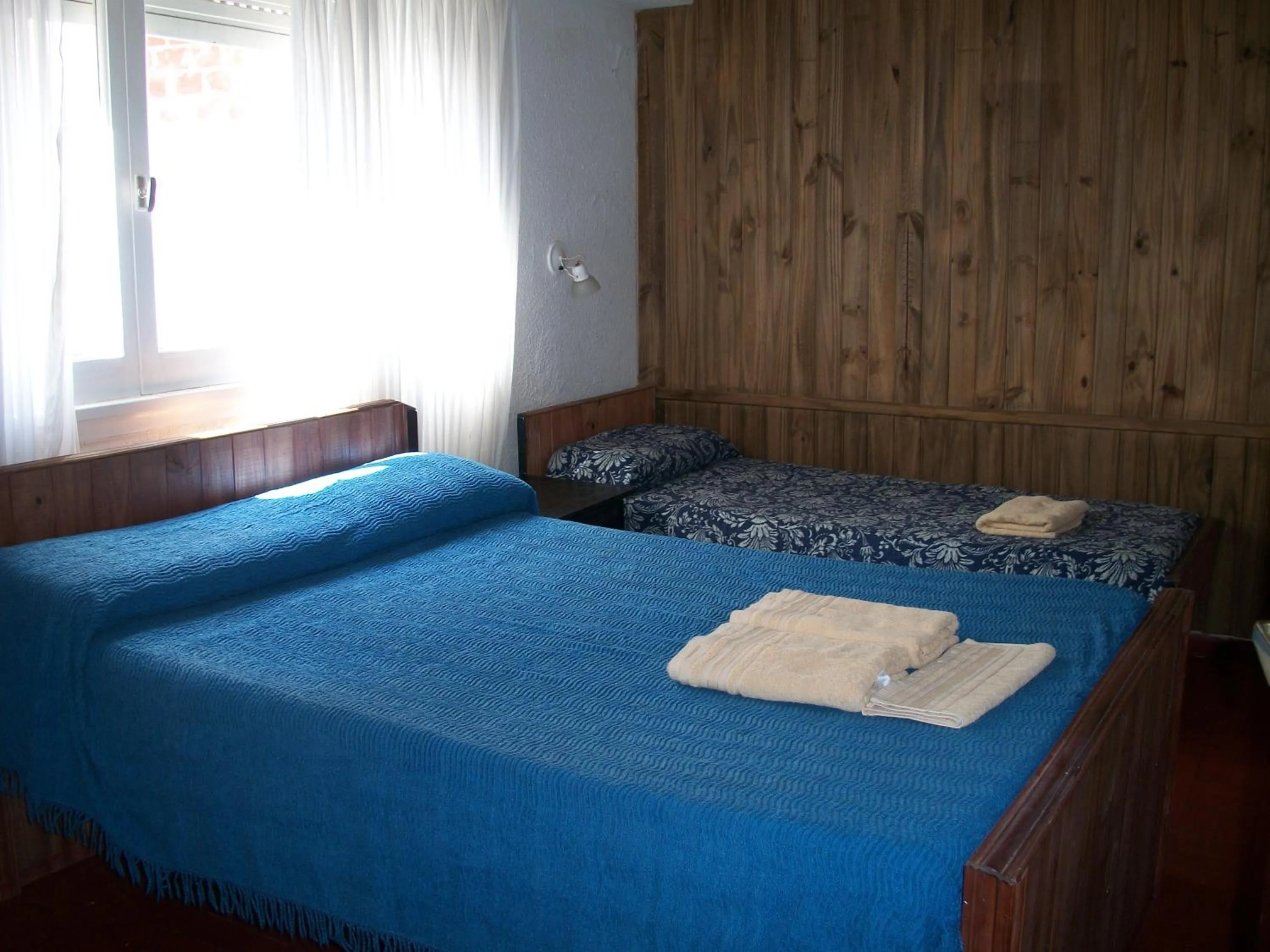 Bed in Hotel Royal