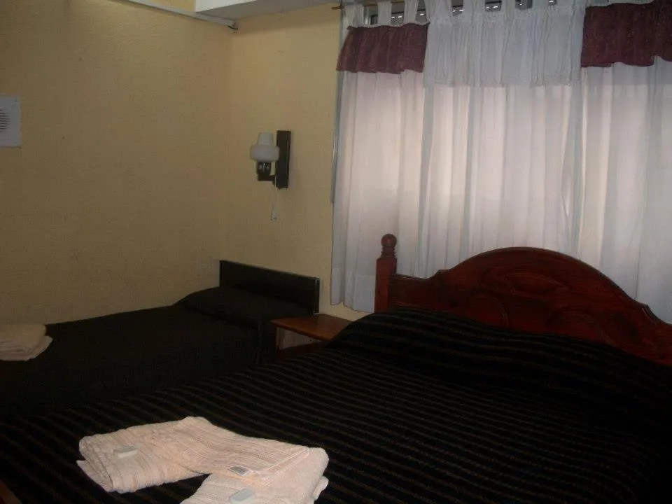 Bed in Hotel Royal