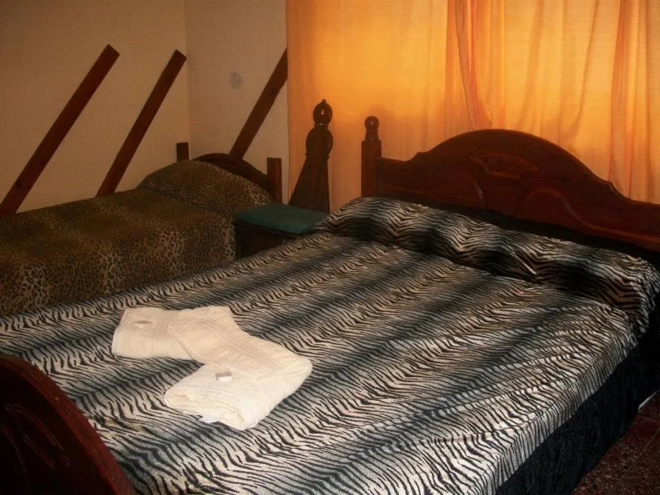 Bed in Hotel Royal