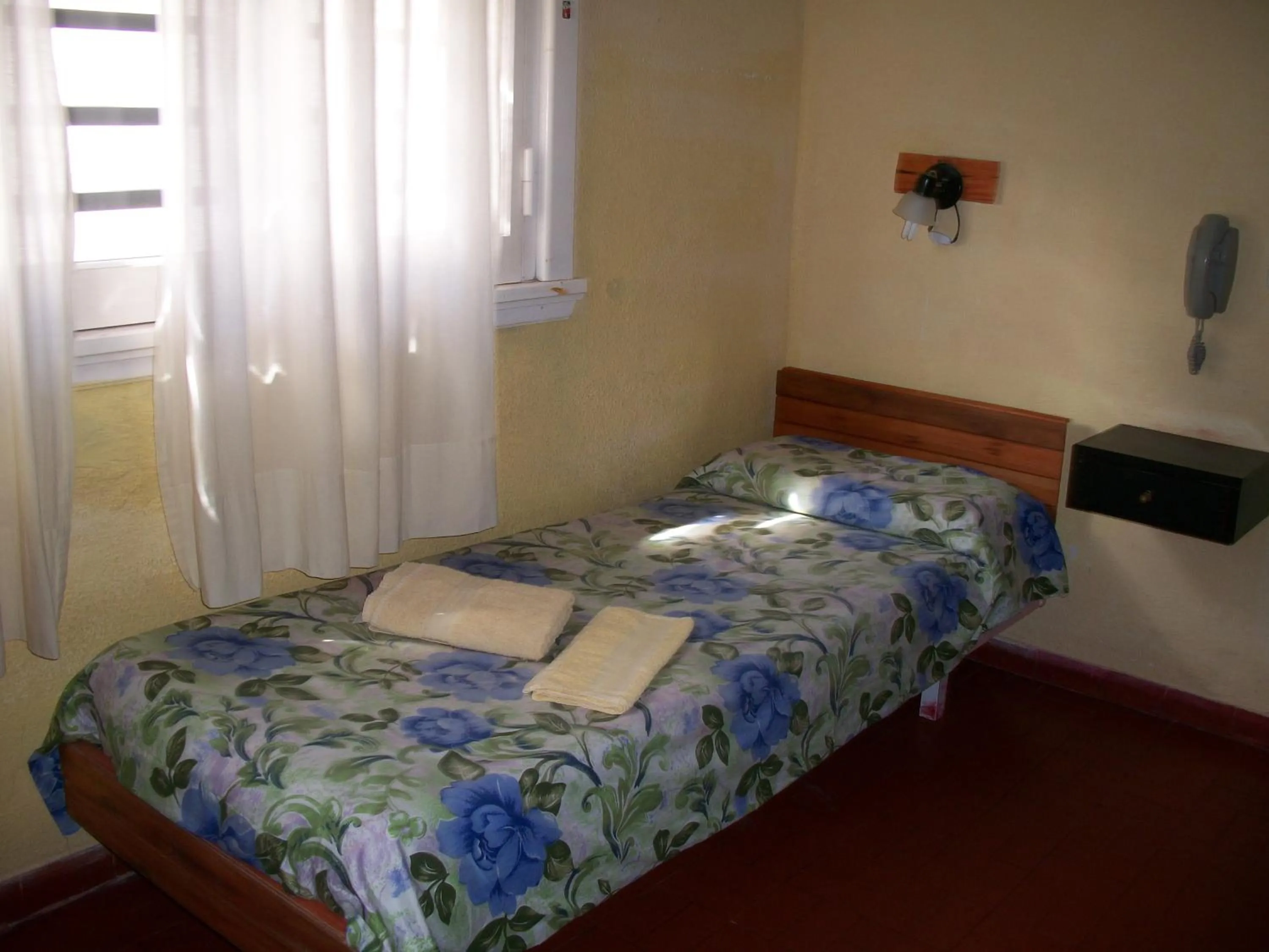 Bed in Hotel Royal