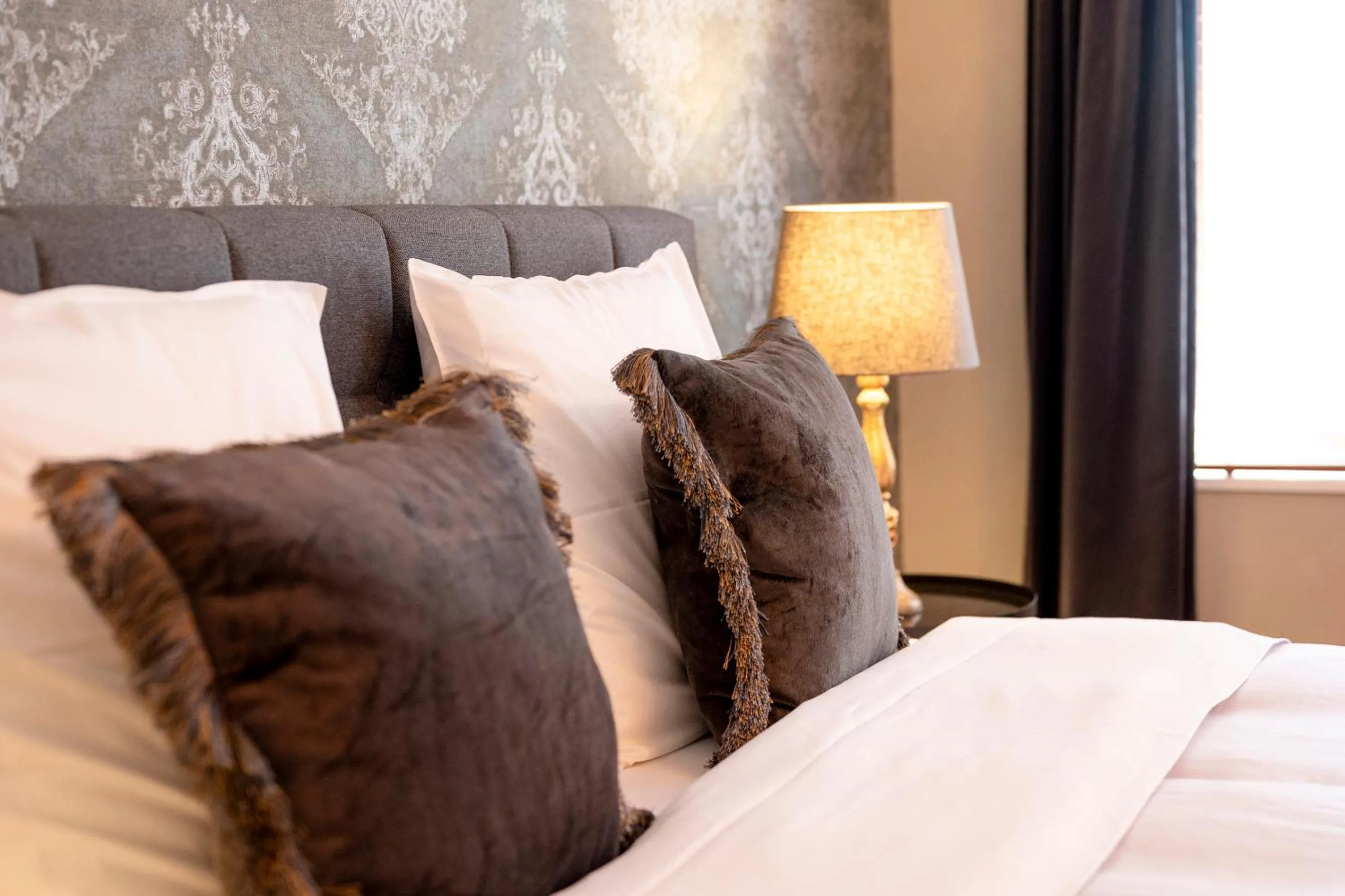 Bed in BnB De Koepoort