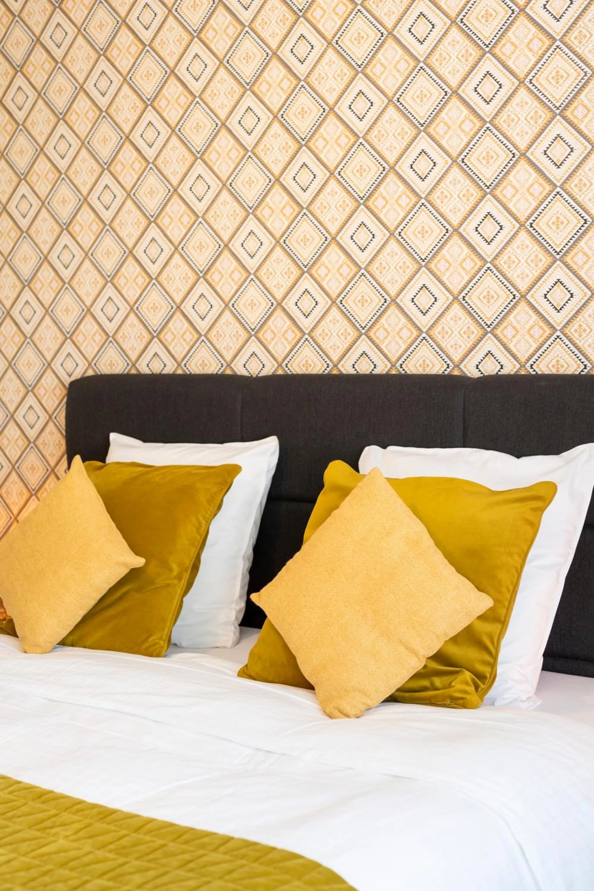 Bed in BnB De Koepoort