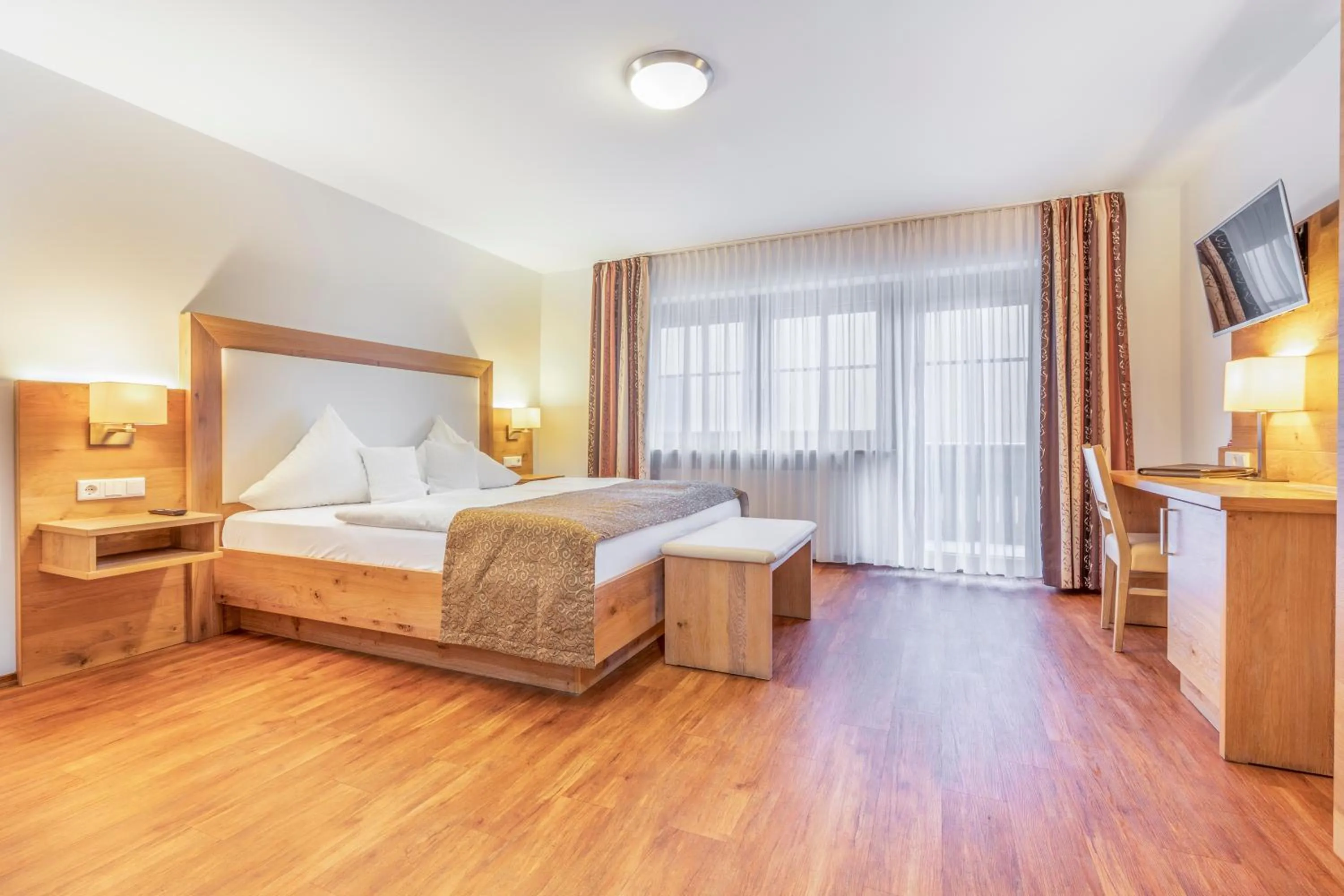 Photo of the whole room, Bed in Wander und Aktiv Hotel Rösslwirt