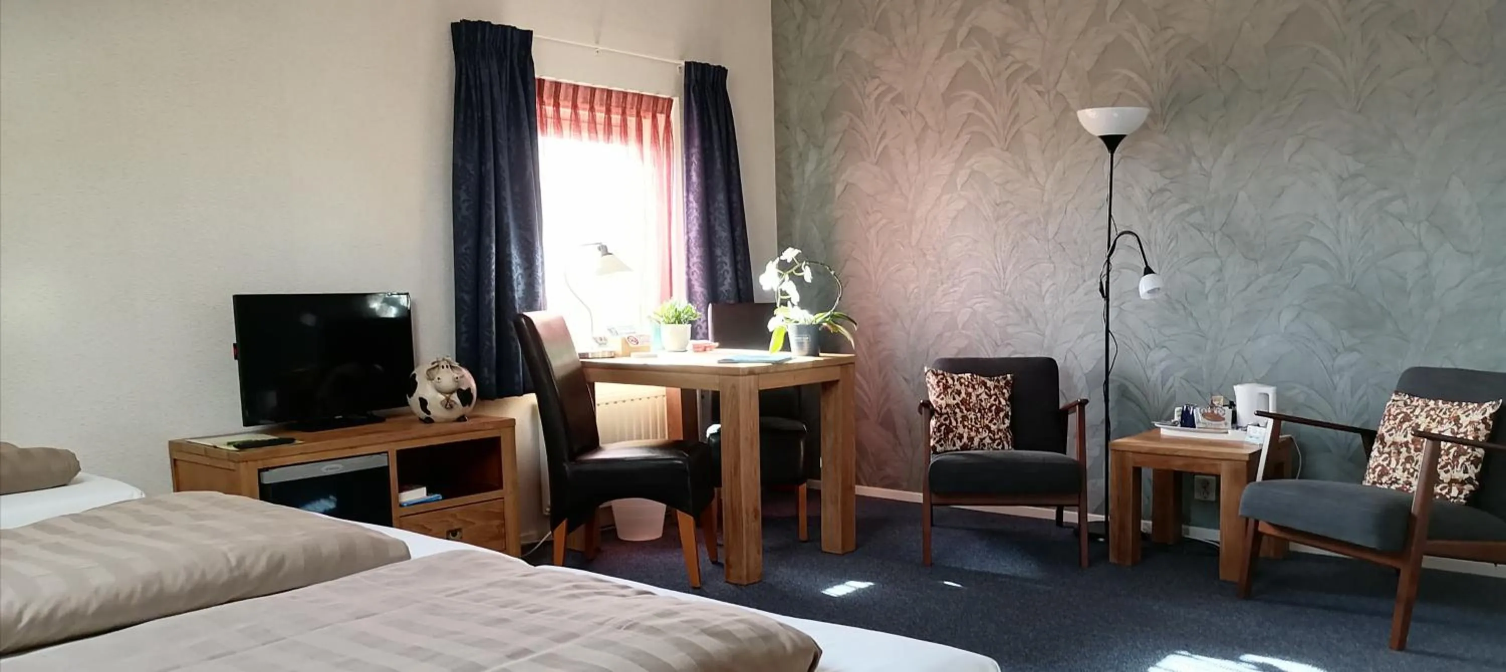 Seating area, Bed in Boerderij Hazenveld