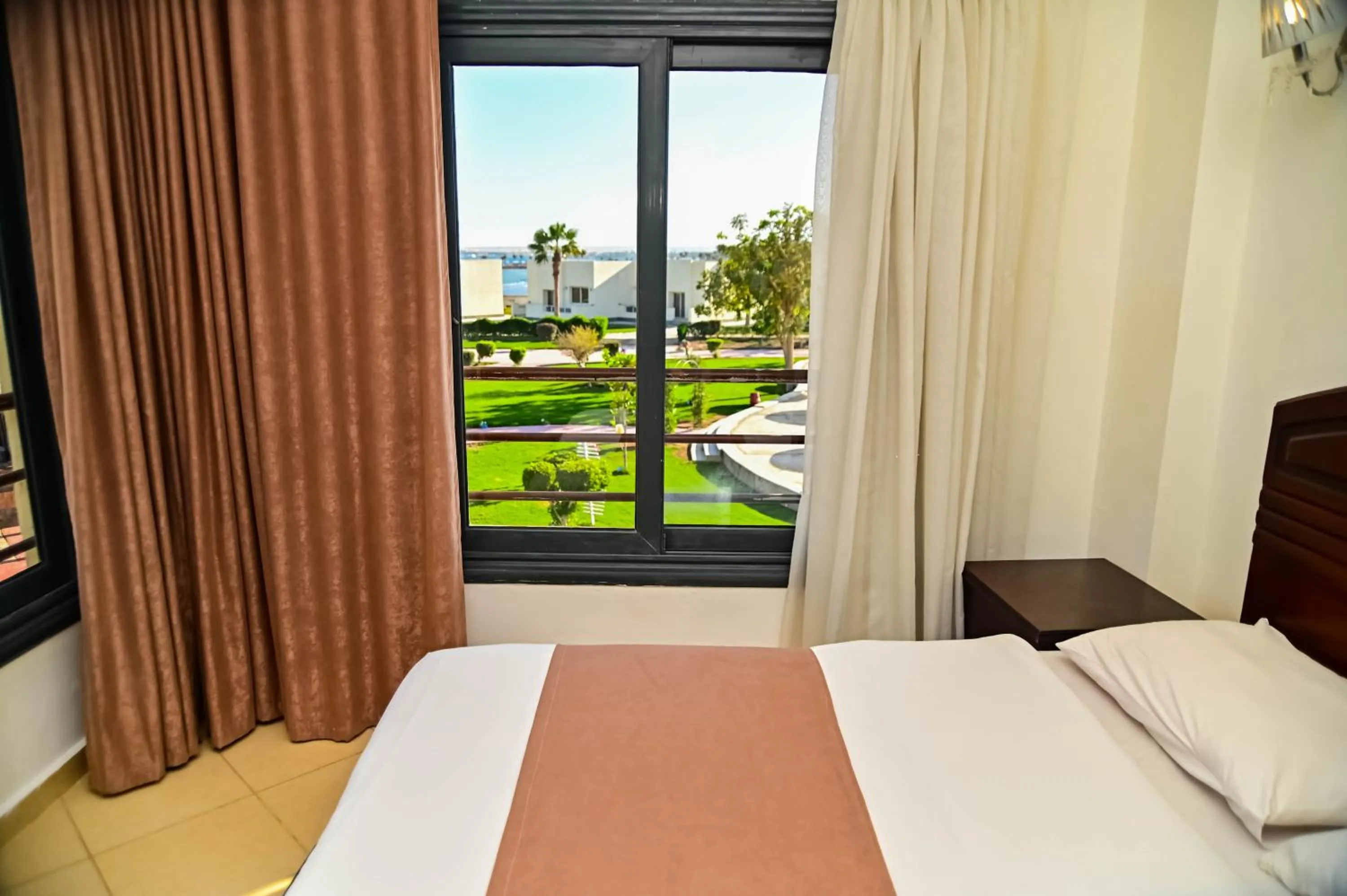 Garden view, Bed in New Eagles Aqua Park Resort