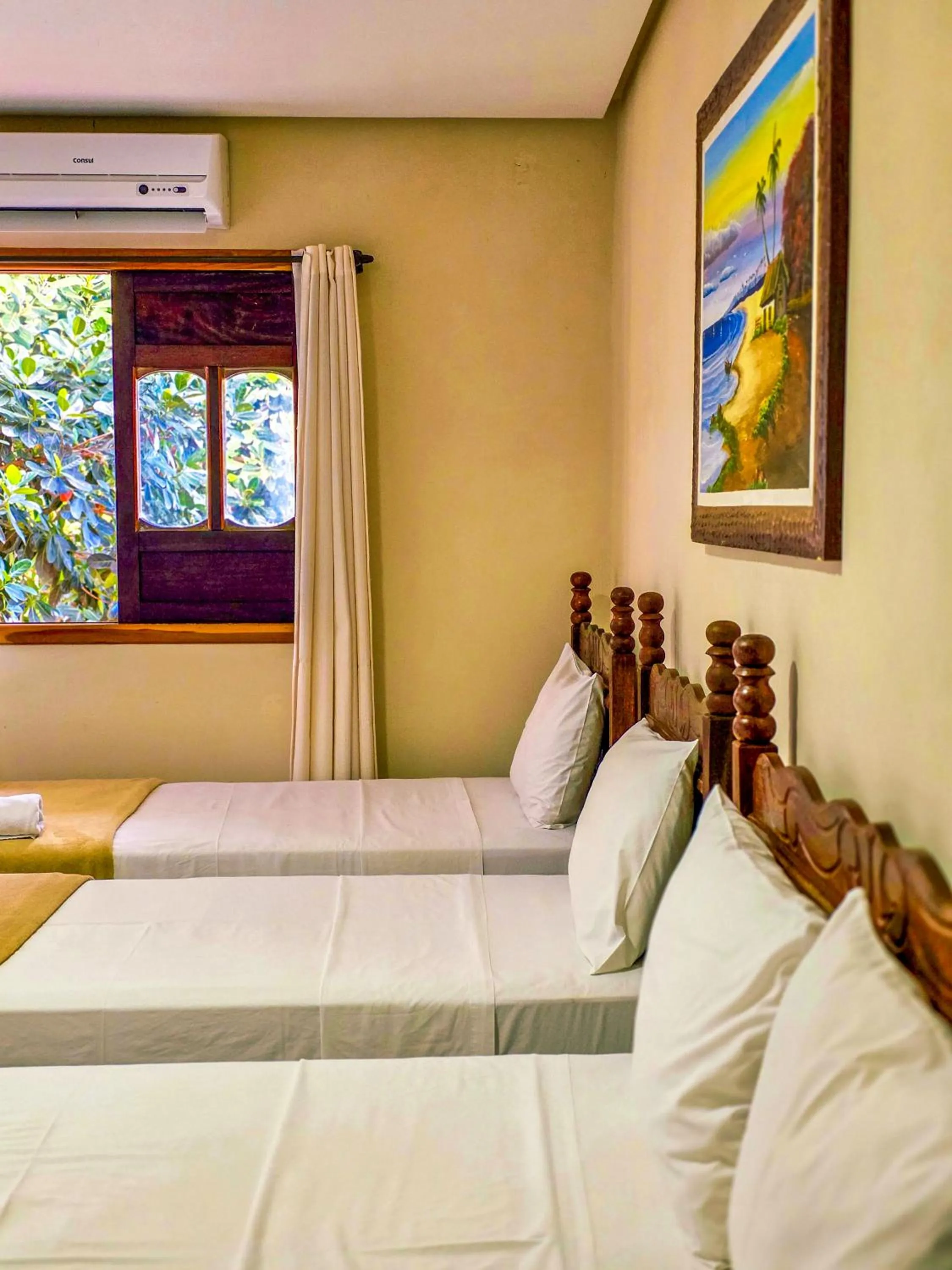 Bed in Vila Sancar Pousada