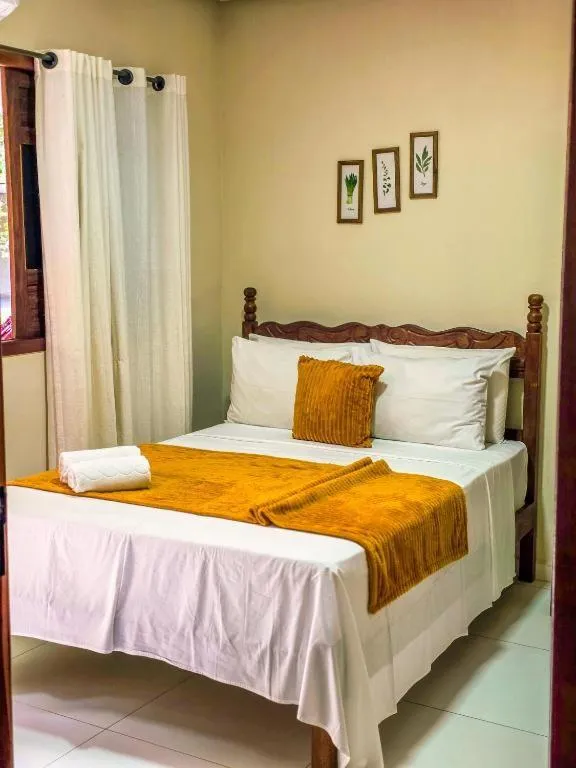 Bed in Vila Sancar Pousada