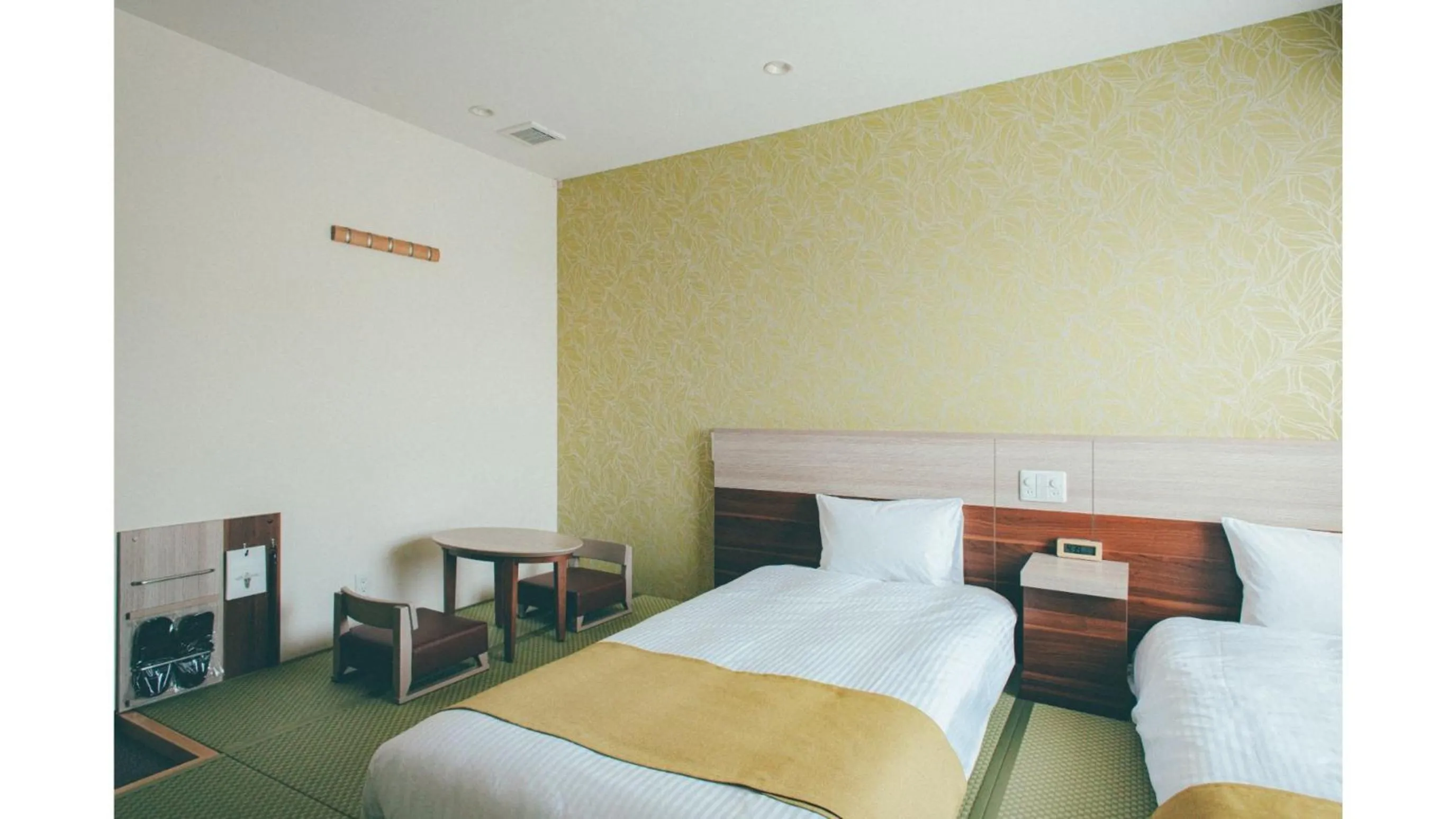 Bed in Kuretake Inn Premium Shizuoka Annex