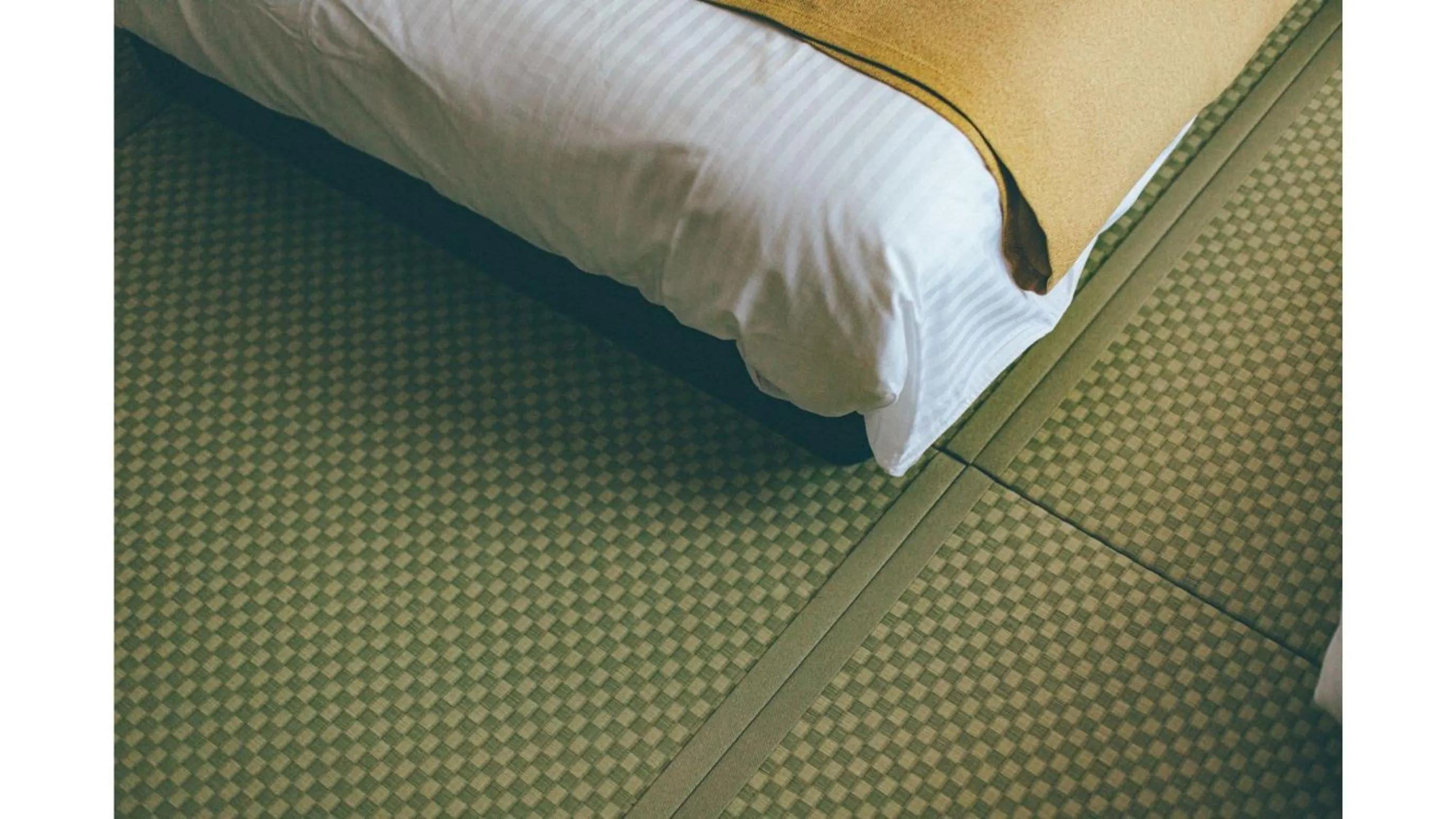 Bed in Kuretake Inn Premium Shizuoka Annex