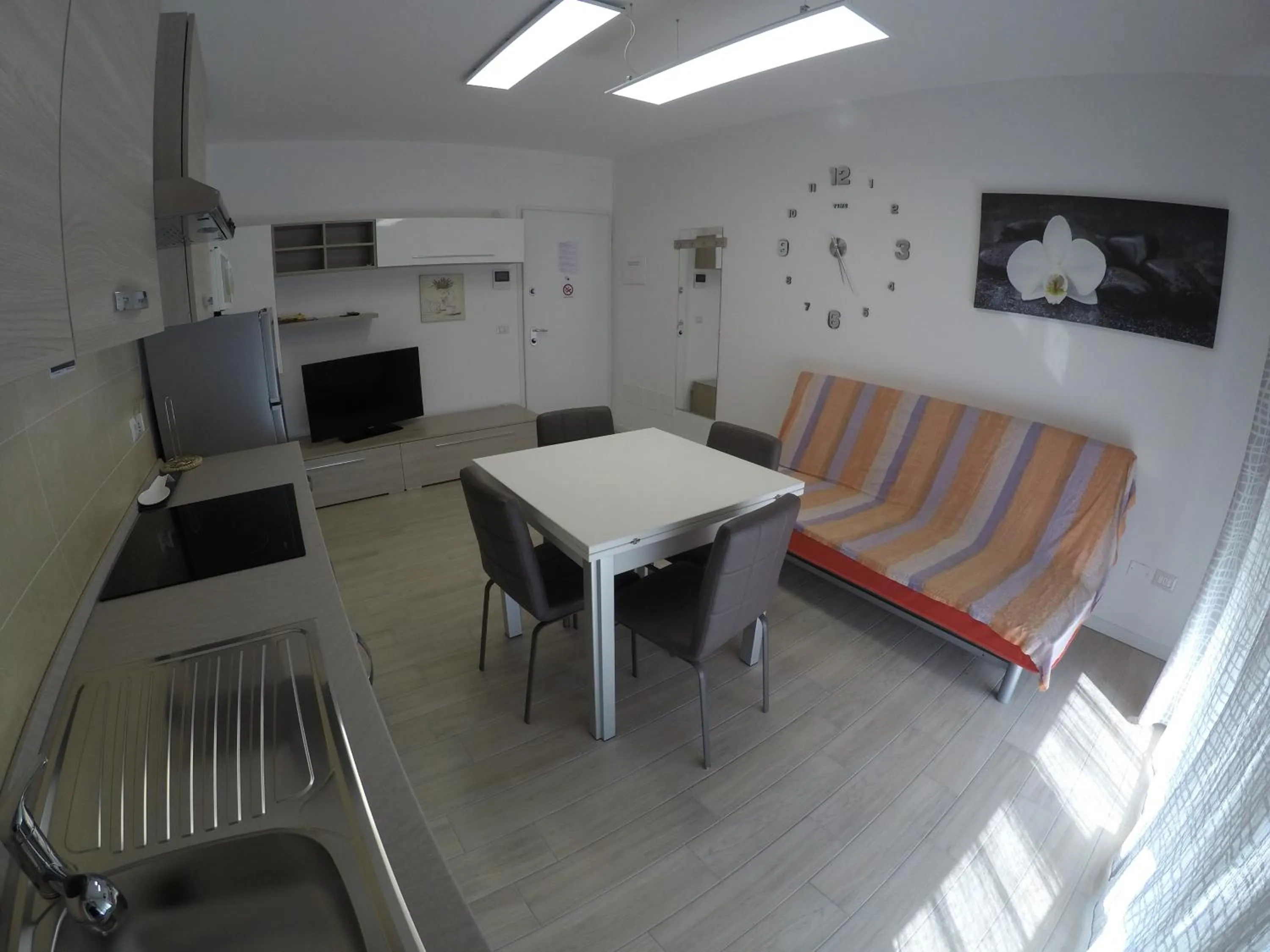 Kitchen or kitchenette in RESIDENCE CAORLE TRILOCALE CON PISCINA - Agenzia Cocal