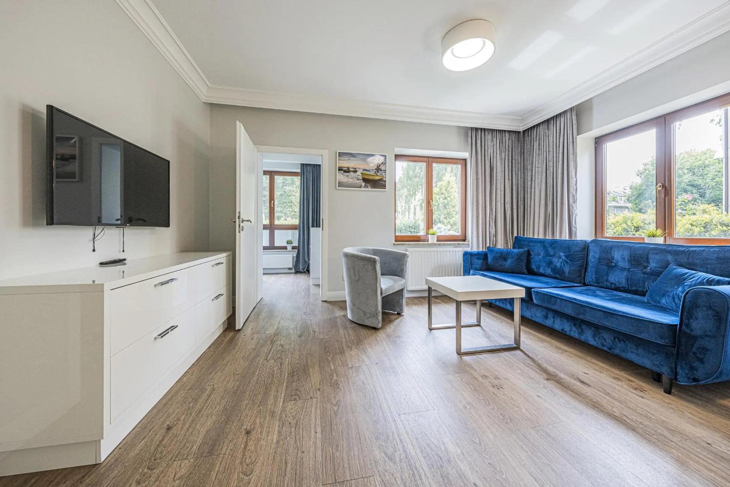 Communal lounge/ TV room in Apartamenty Martini