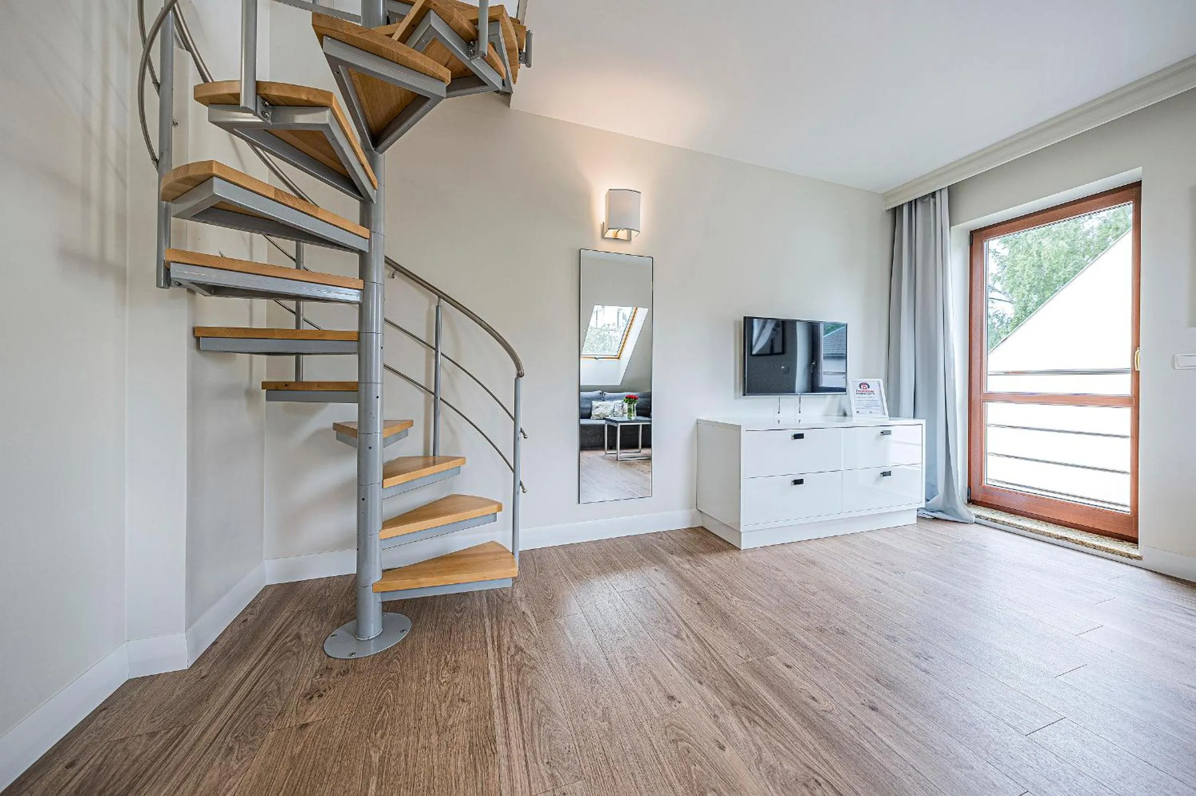 Communal lounge/ TV room in Apartamenty Martini