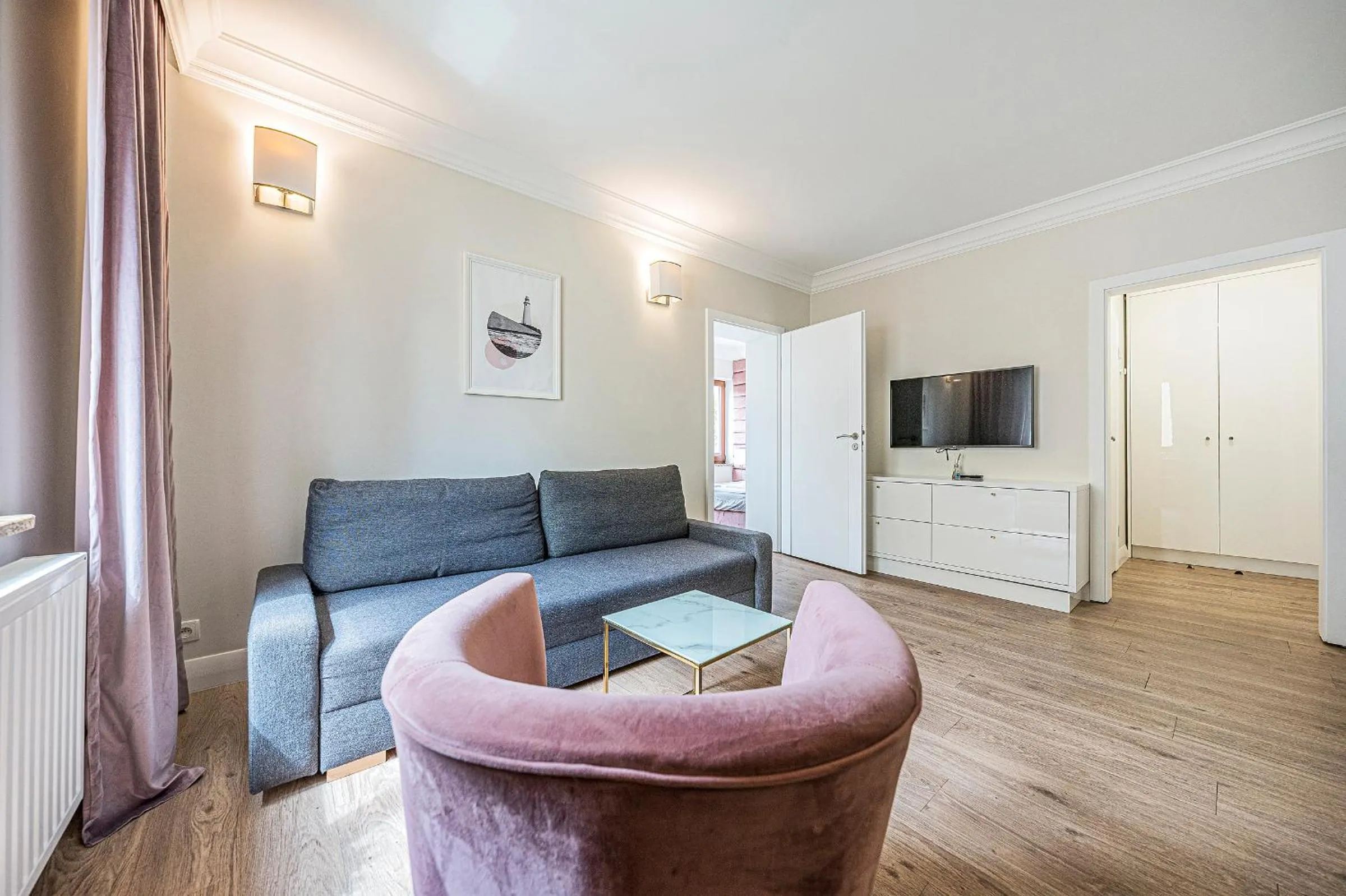 Communal lounge/ TV room in Apartamenty Martini