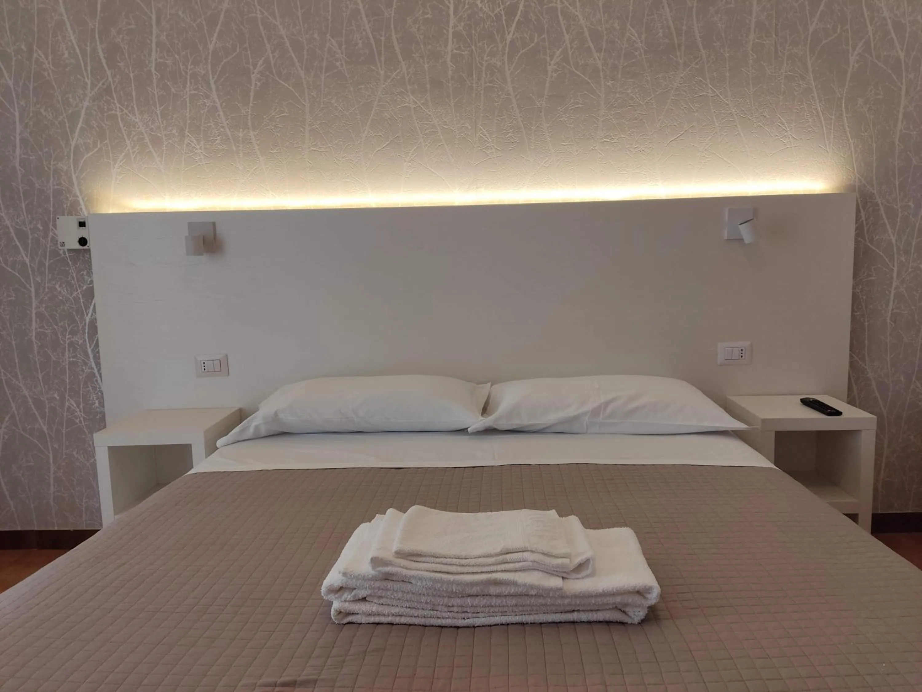 Bed in Albergo Conca d'Oro