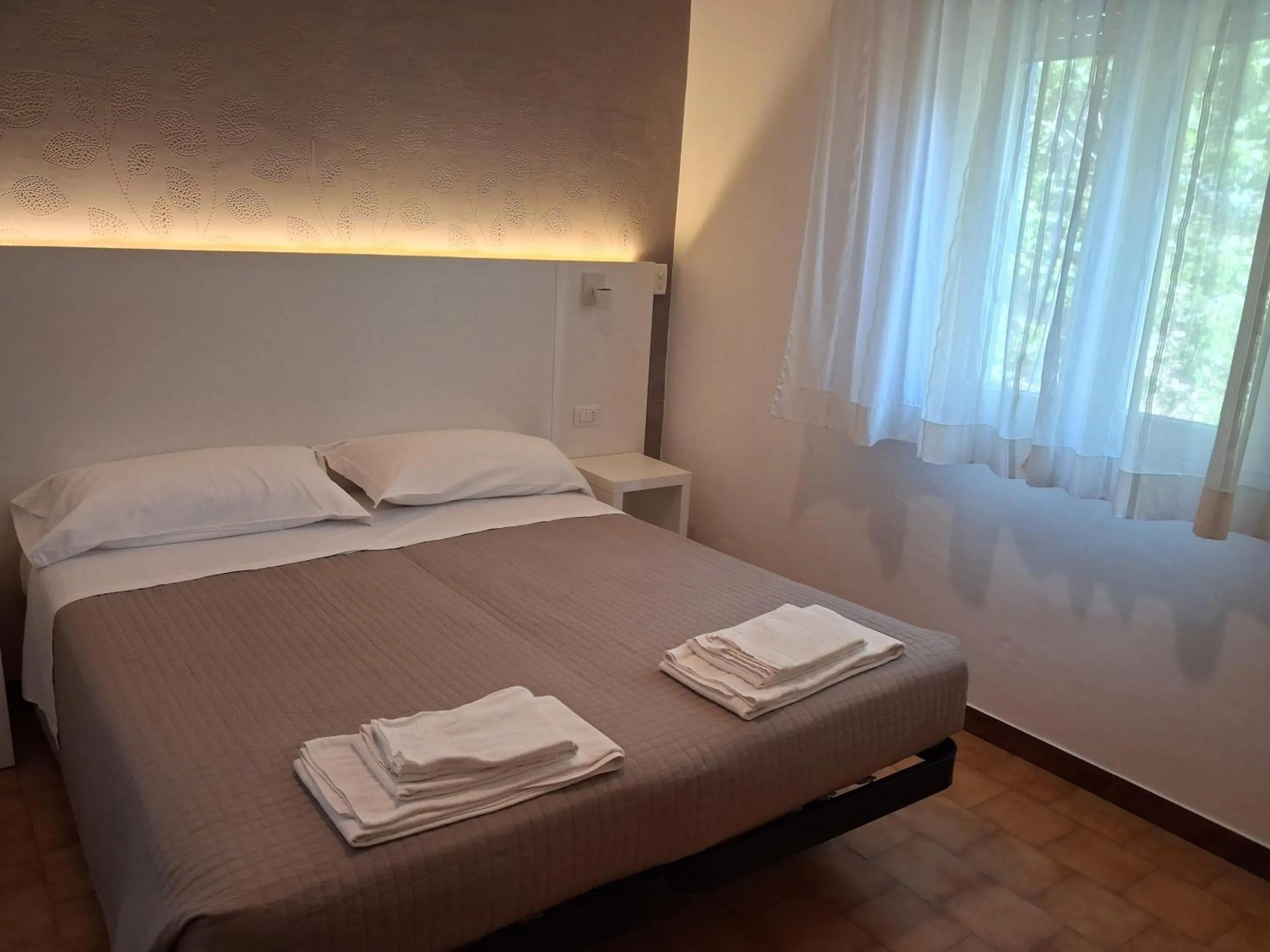 Bed in Albergo Conca d'Oro
