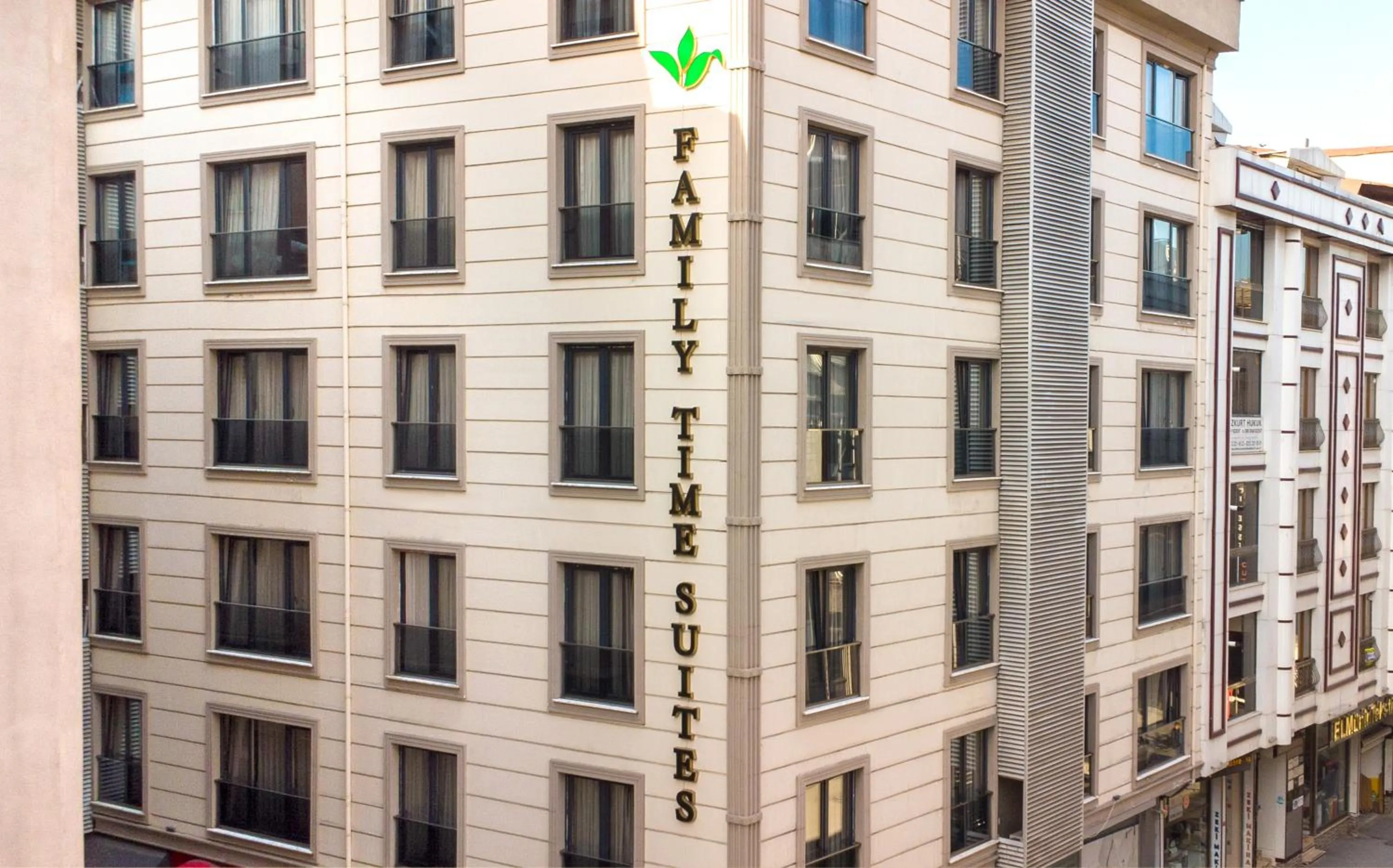 Property building in Family Time Suites Hotel