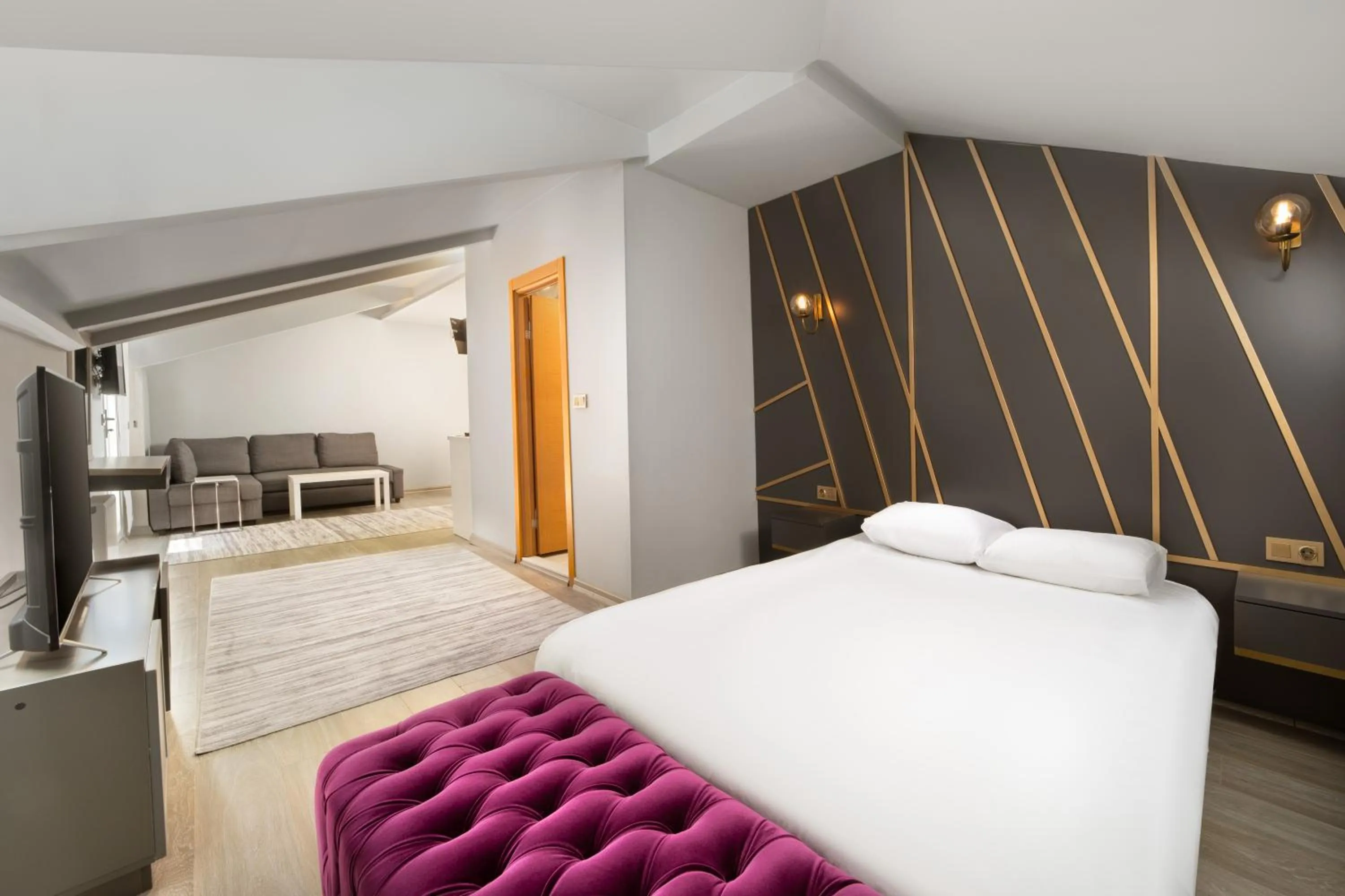 Bed in Family Time Suites Hotel