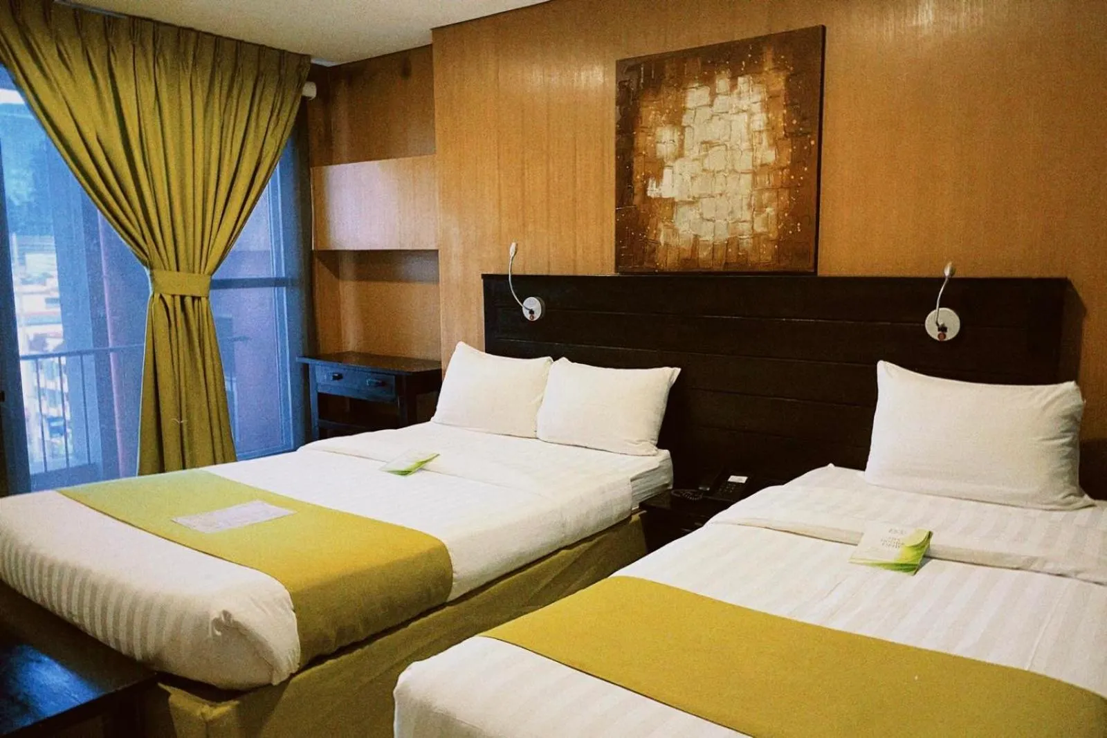 Bed in Jade Hotel and Suites