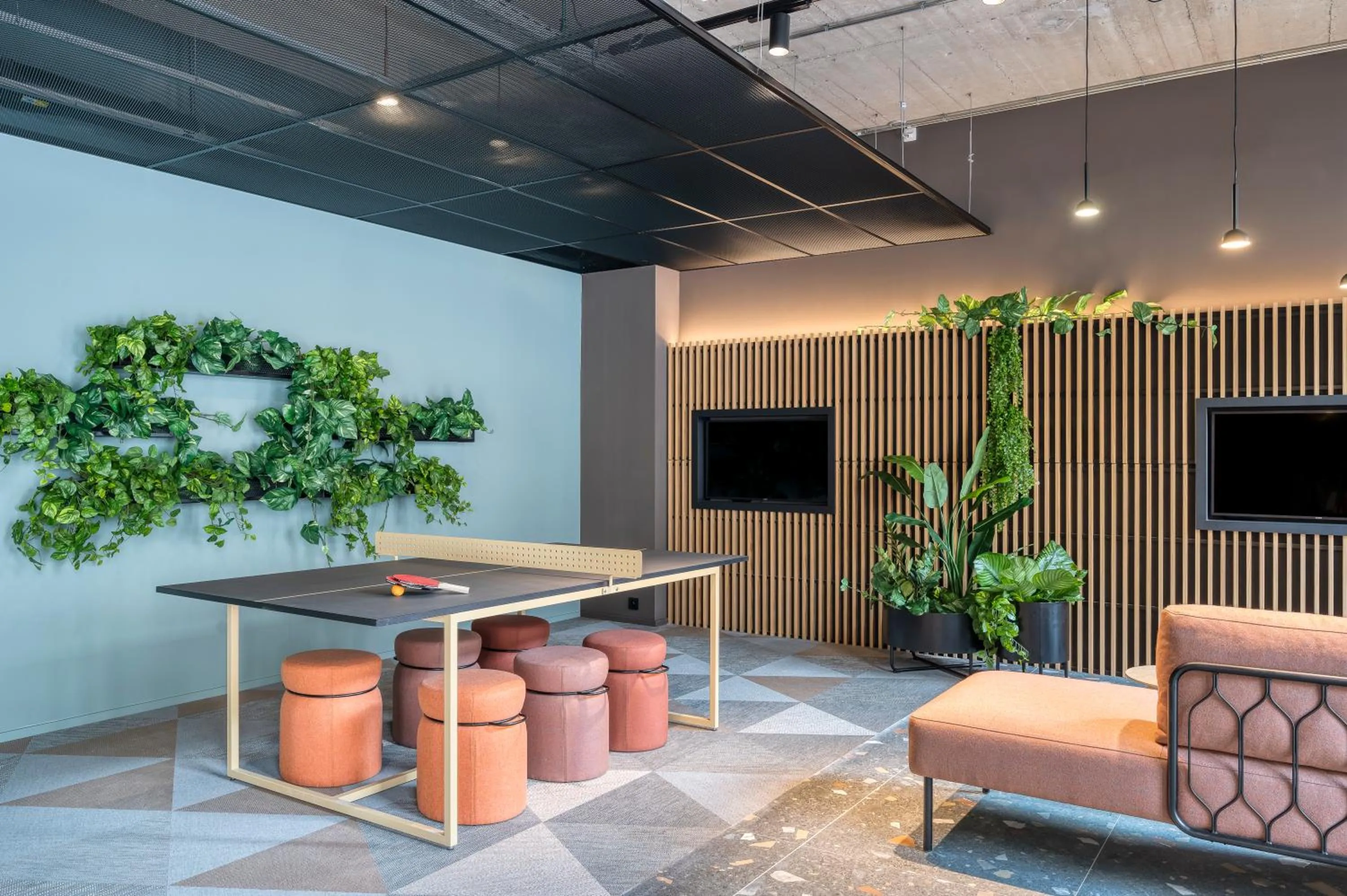 Communal lounge/ TV room in Citybox Antwerp City Center