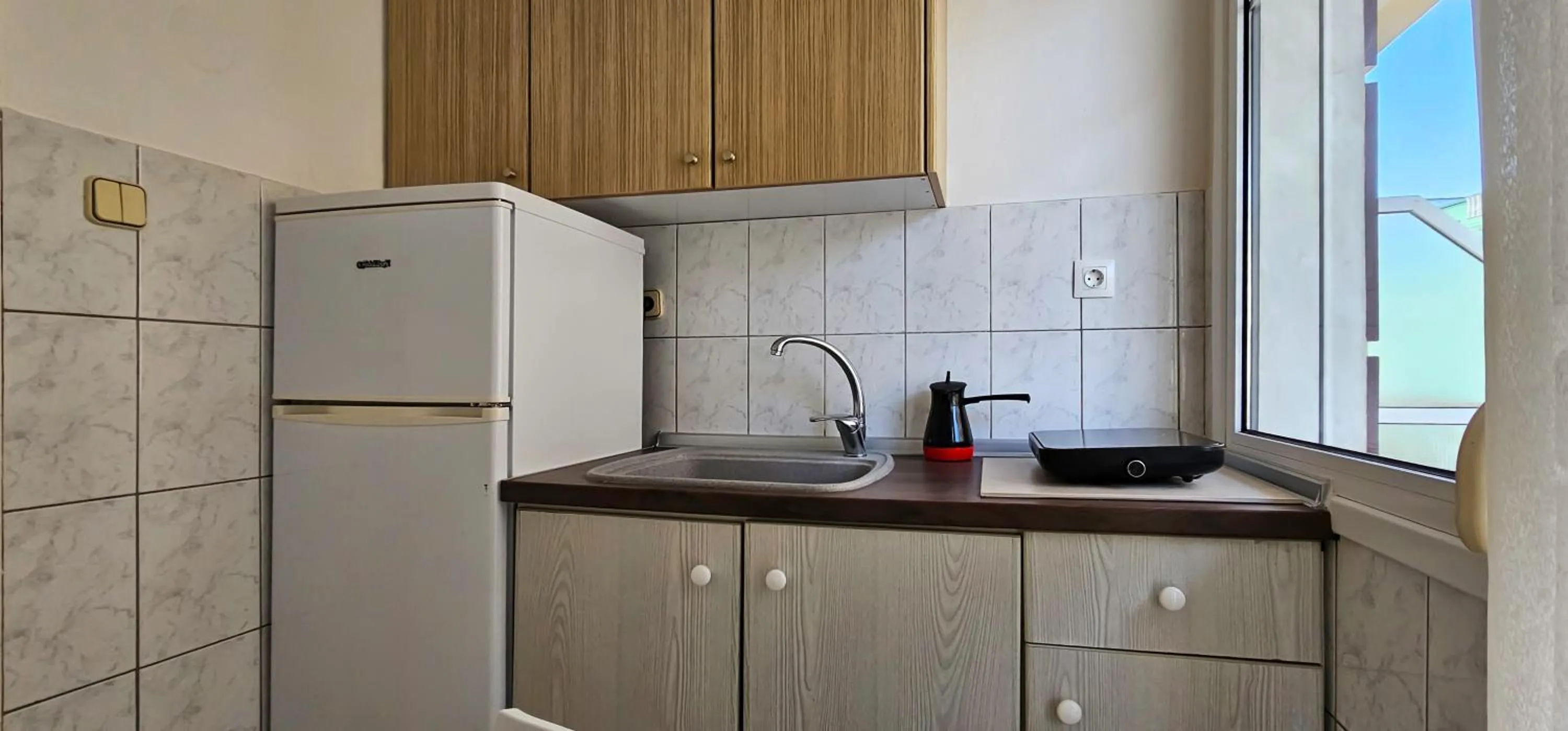 Kitchen or kitchenette in Chariclia Hotel