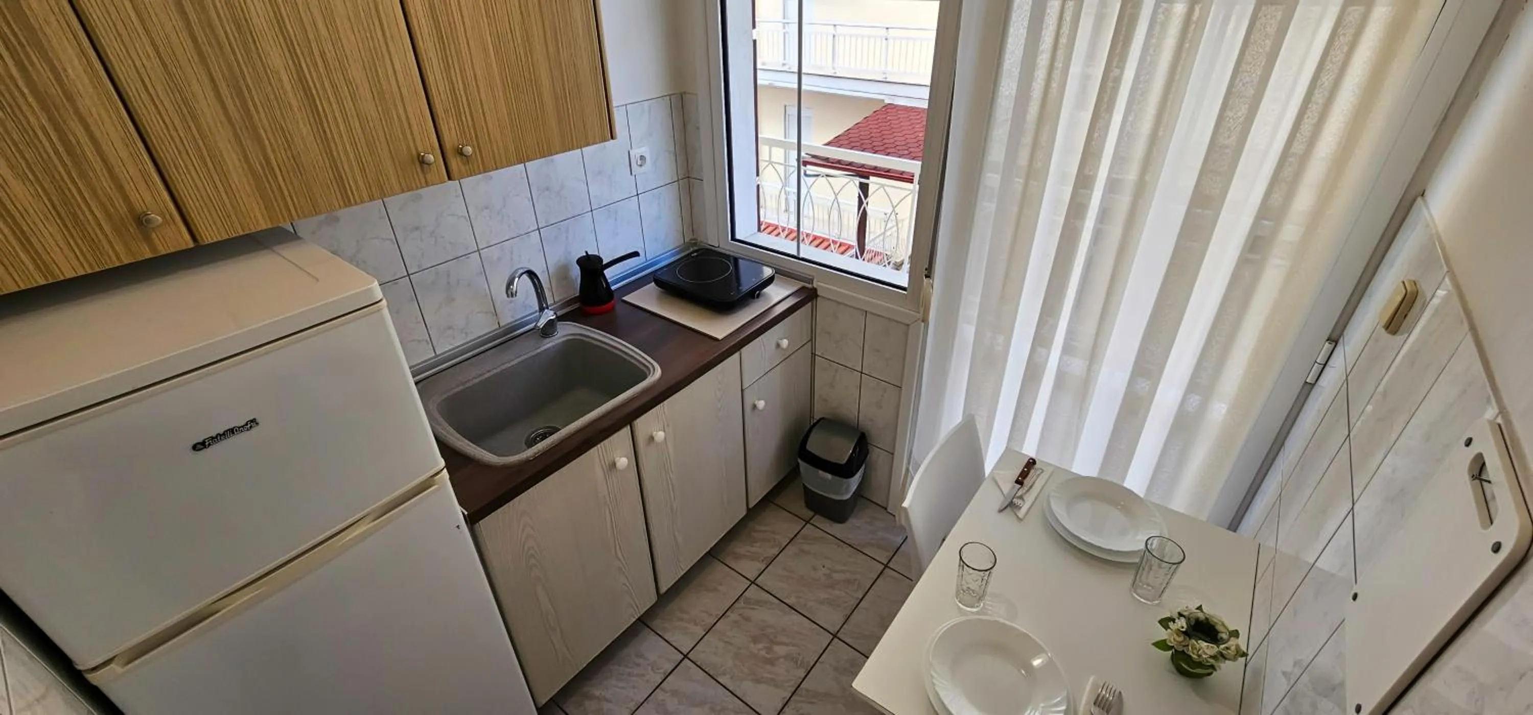 Kitchen or kitchenette in Chariclia Hotel