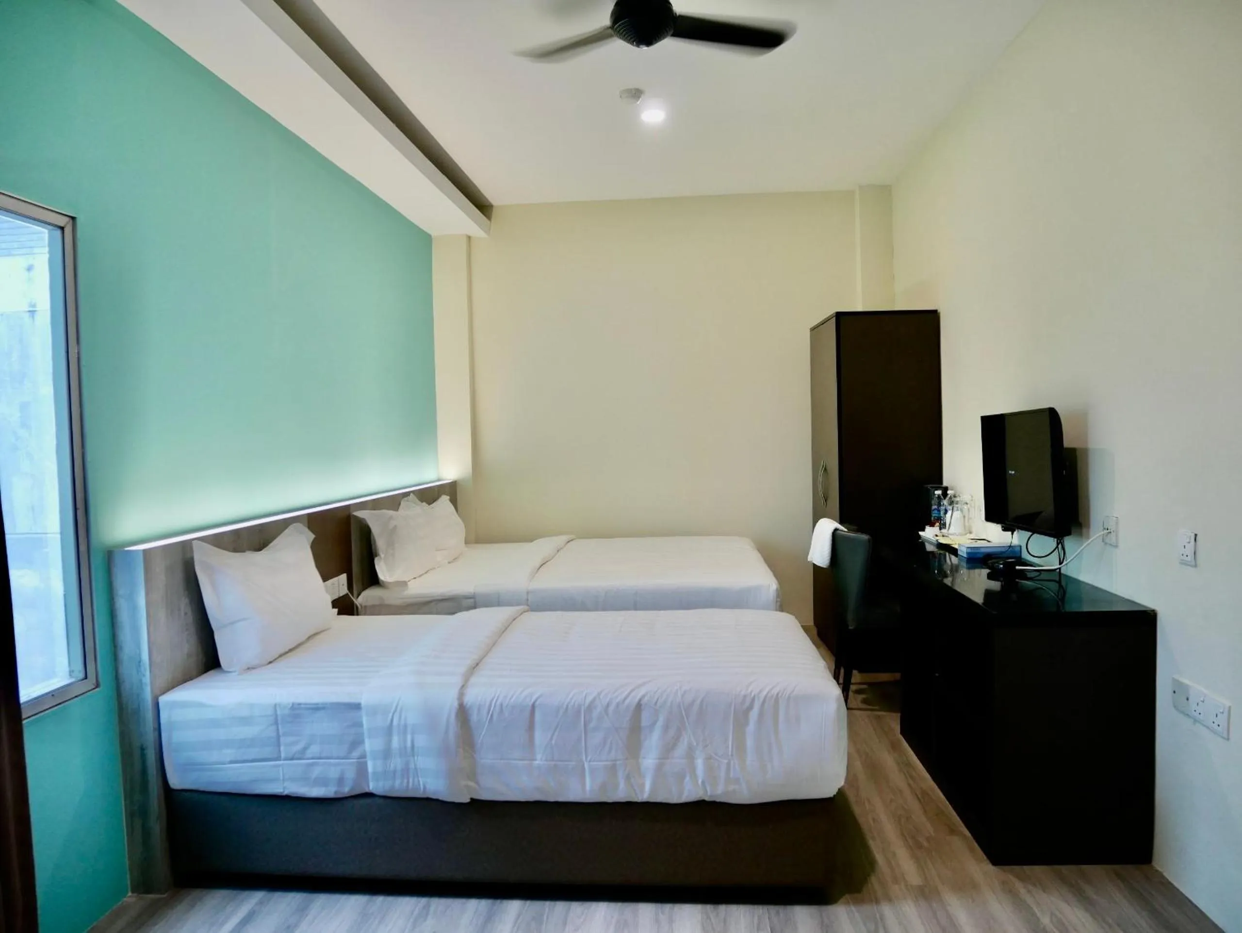 Photo of the whole room, Bed in Pantai Regal City Hotel