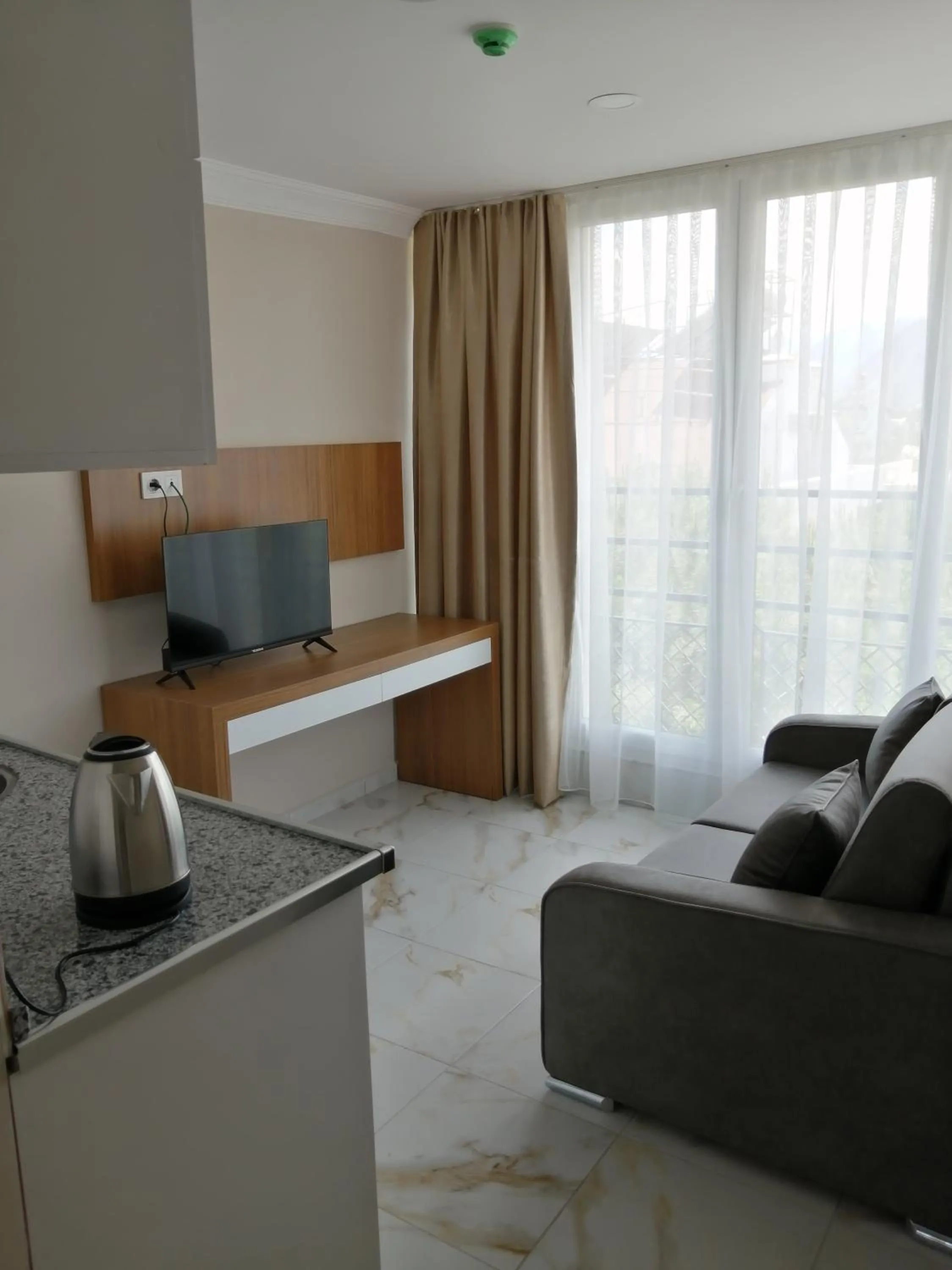 Seating area in REGA OTEL