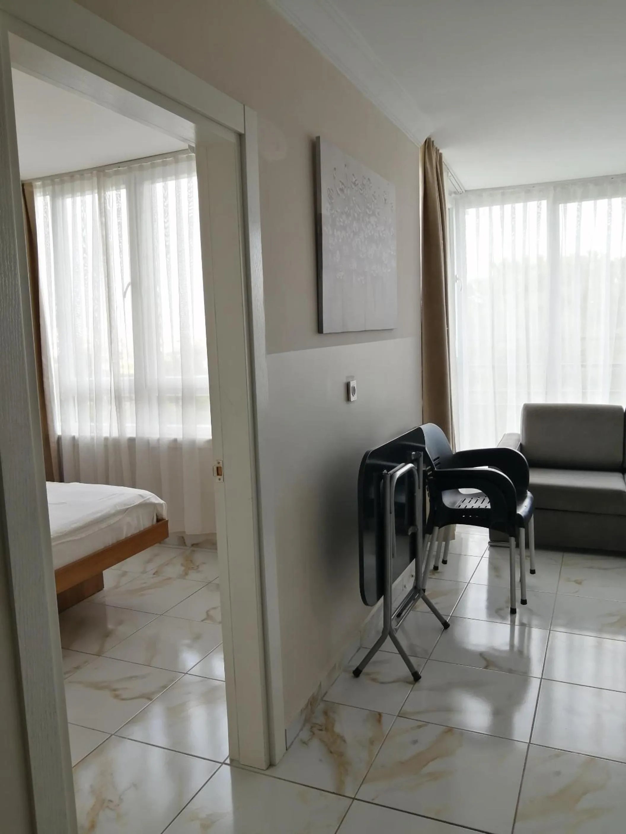 Living room, Bed in REGA OTEL