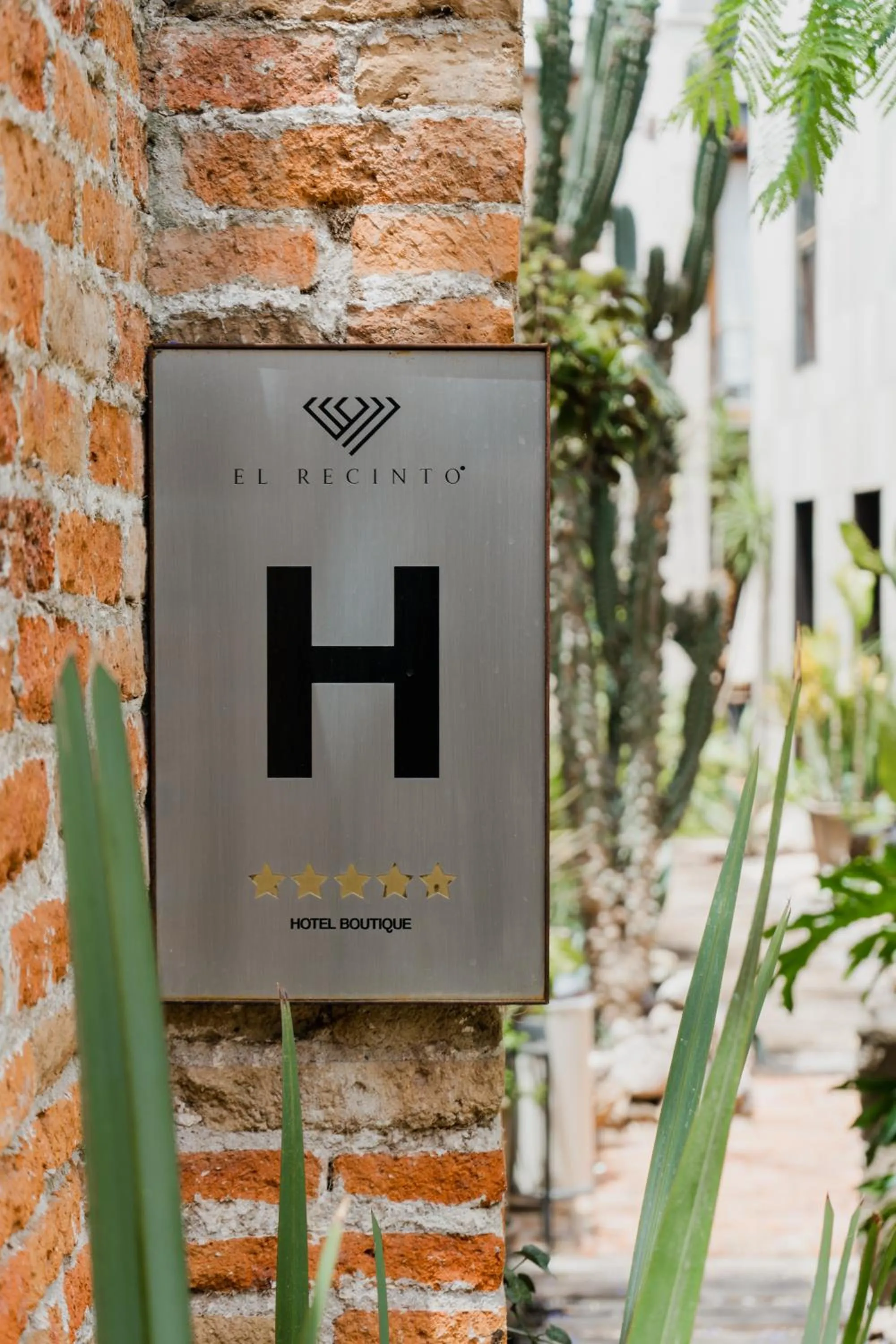 Logo/Certificate/Sign in El Recinto Luxury Hotel