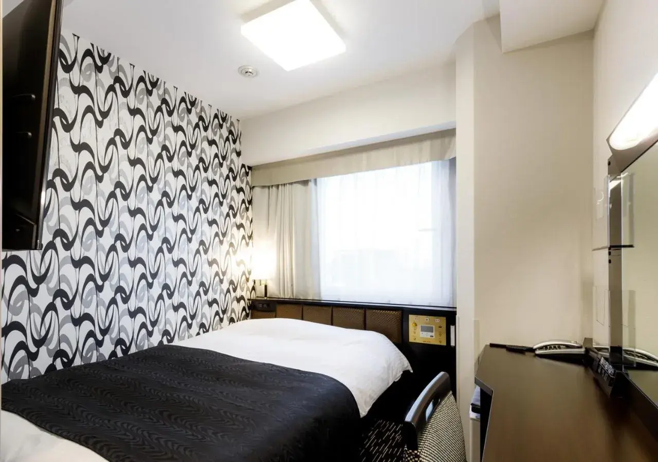 Bed in APA Hotel Asakusa Kaminarimon Minami Bed in APA Hotel Asakusa Kaminarimon Minami